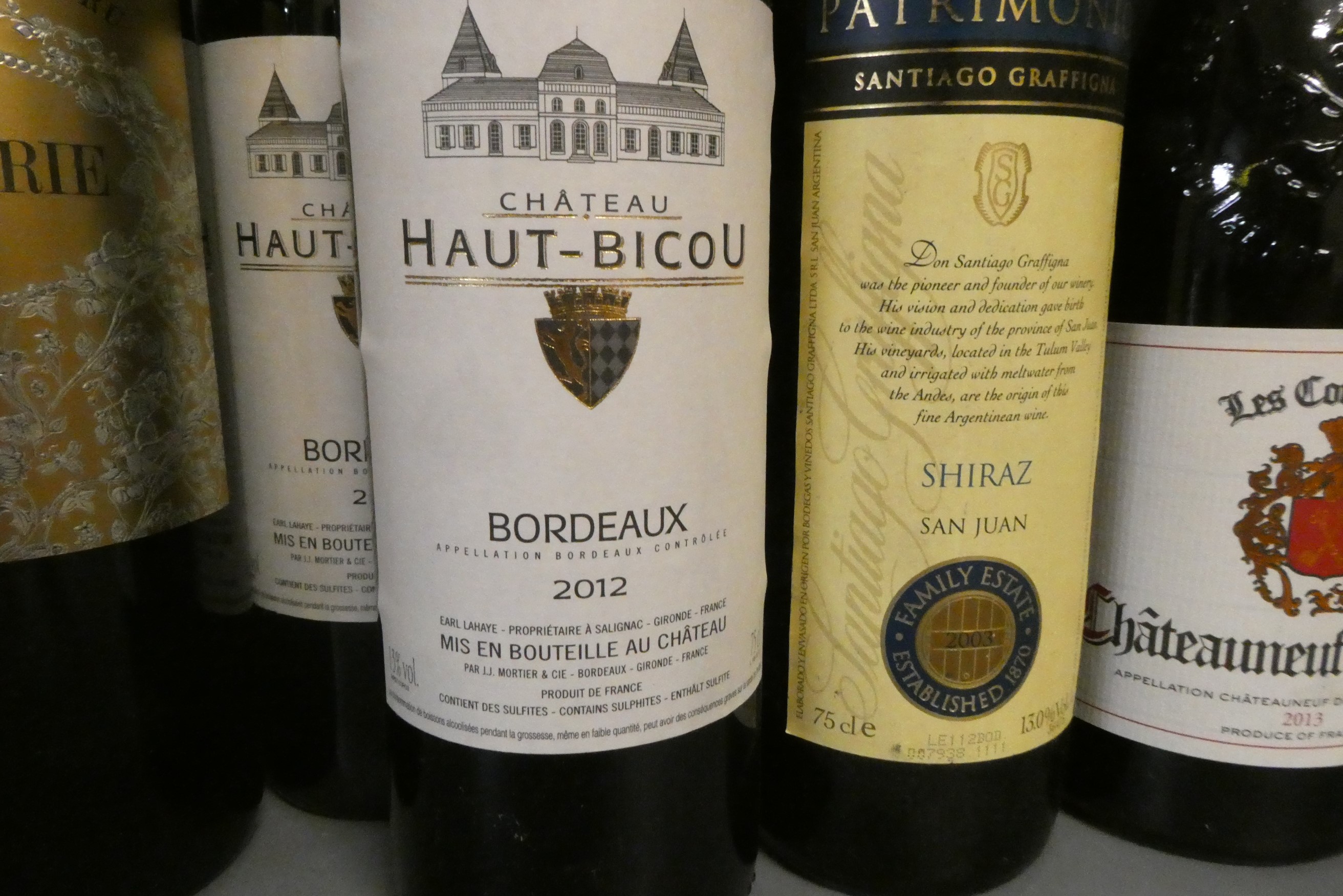 Twelve bottles of mainly French bordeaux including Ch. Grand Faurie La Rose 2010 Saint-Emilion grand Image