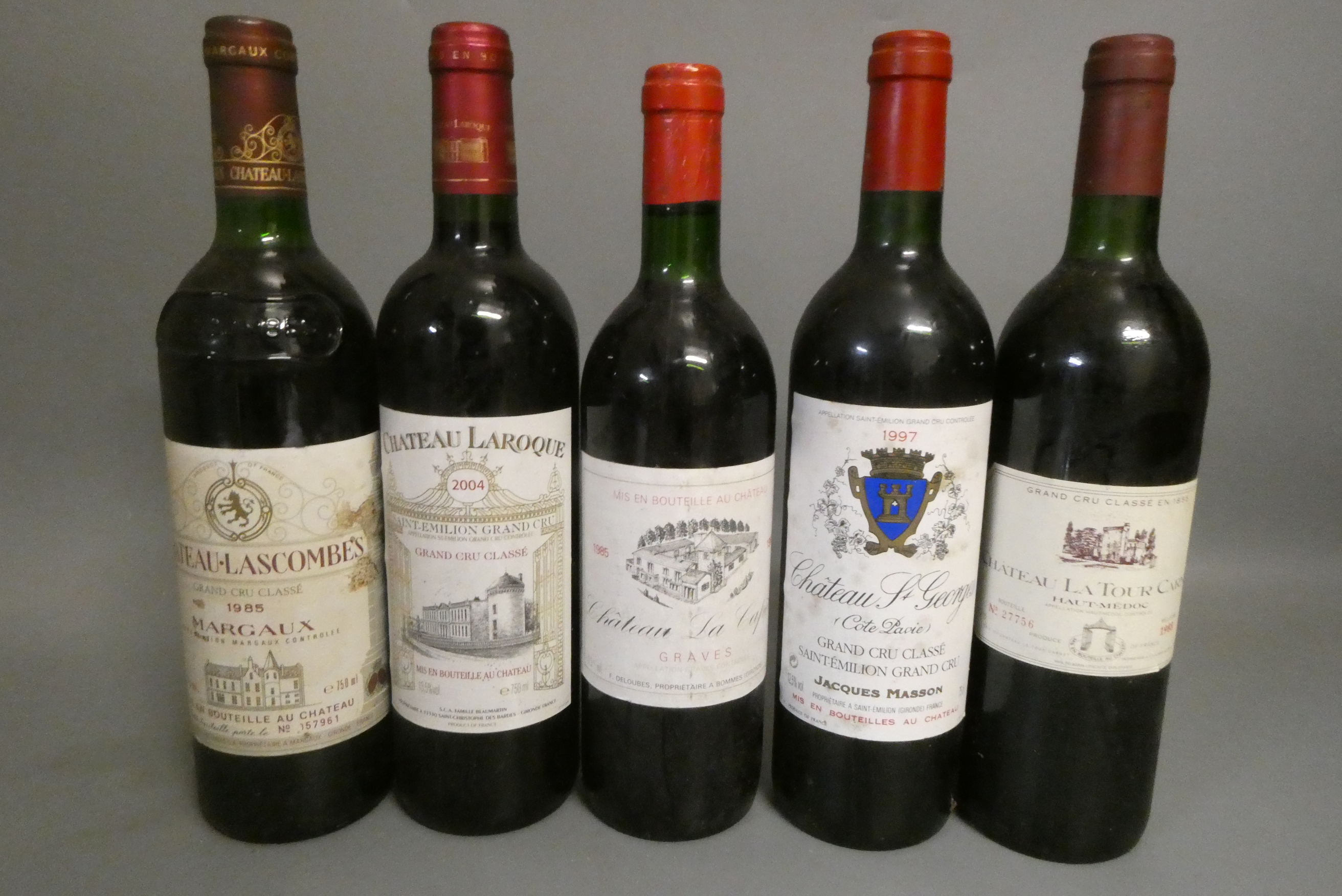 Five bottles of red bordeaux Image