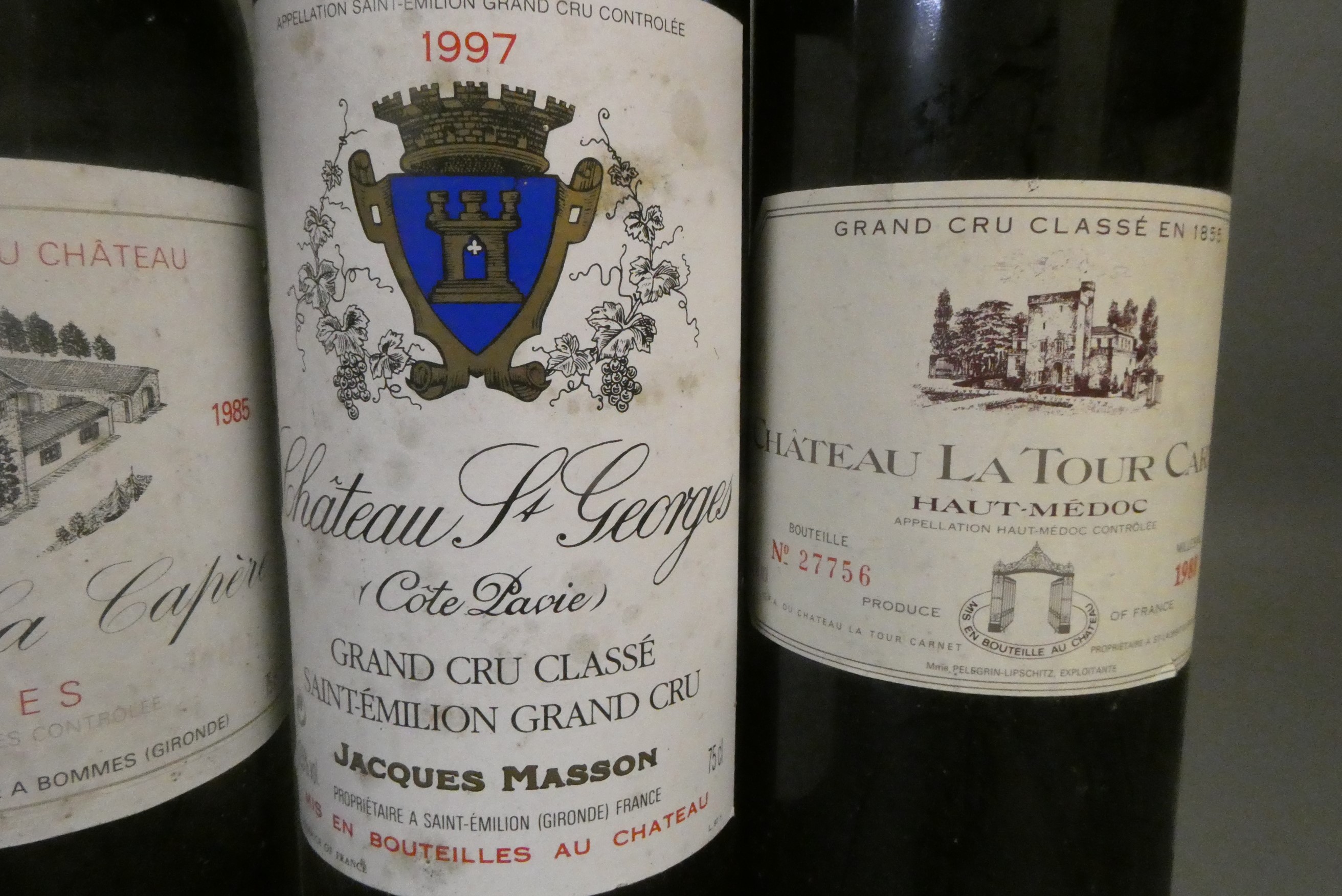 Five bottles of red bordeaux Image