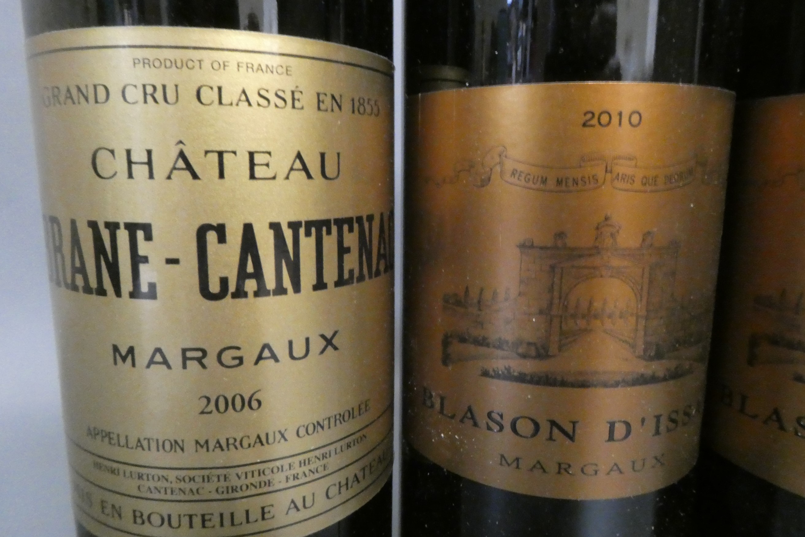 Three bottles Margaux, comprising one 2006 Chateau Brane-Cantenac, and two 2010 Blason D'Issan (Est. Image
