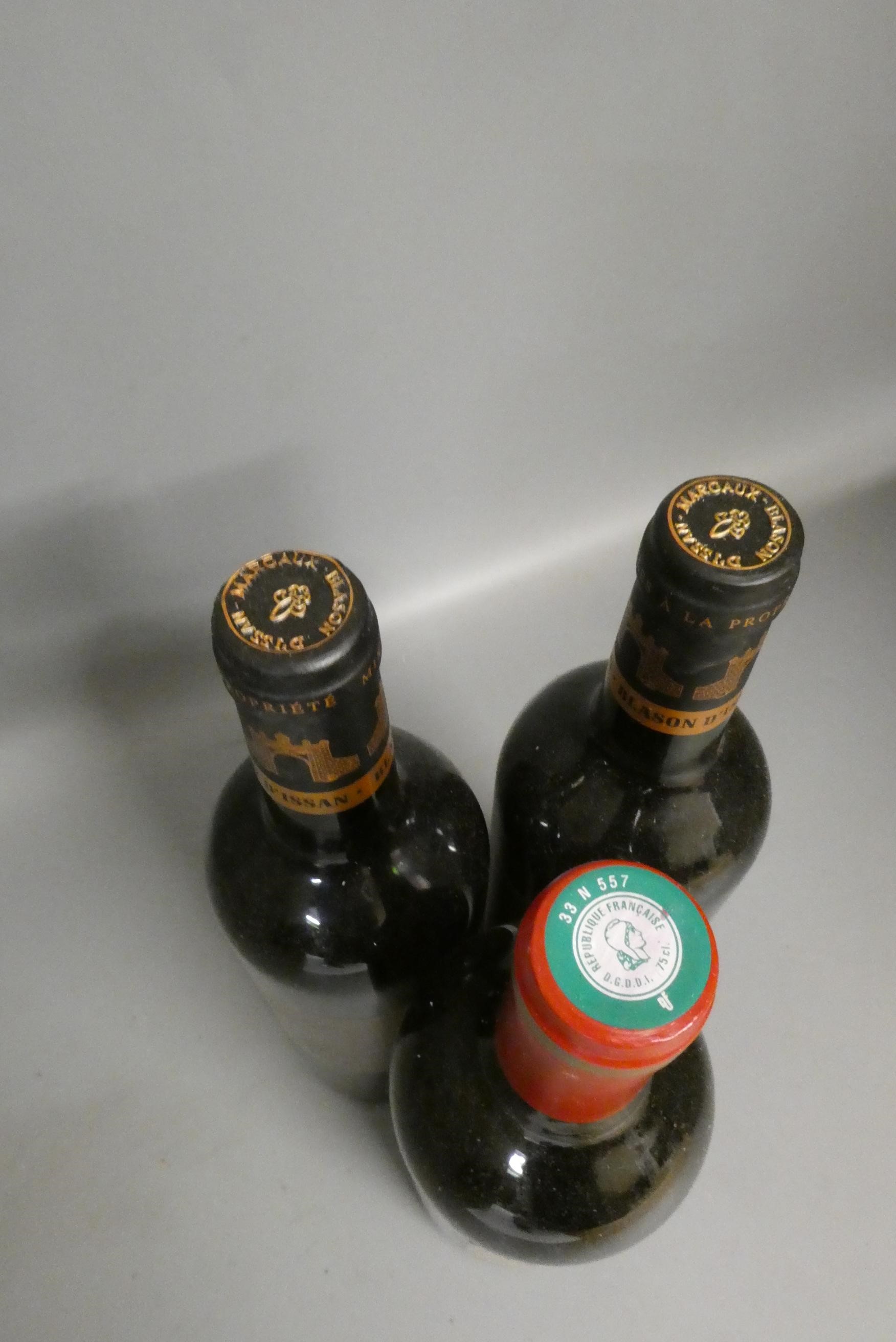 Three bottles Margaux, comprising one 2006 Chateau Brane-Cantenac, and two 2010 Blason D'Issan (Est. Image