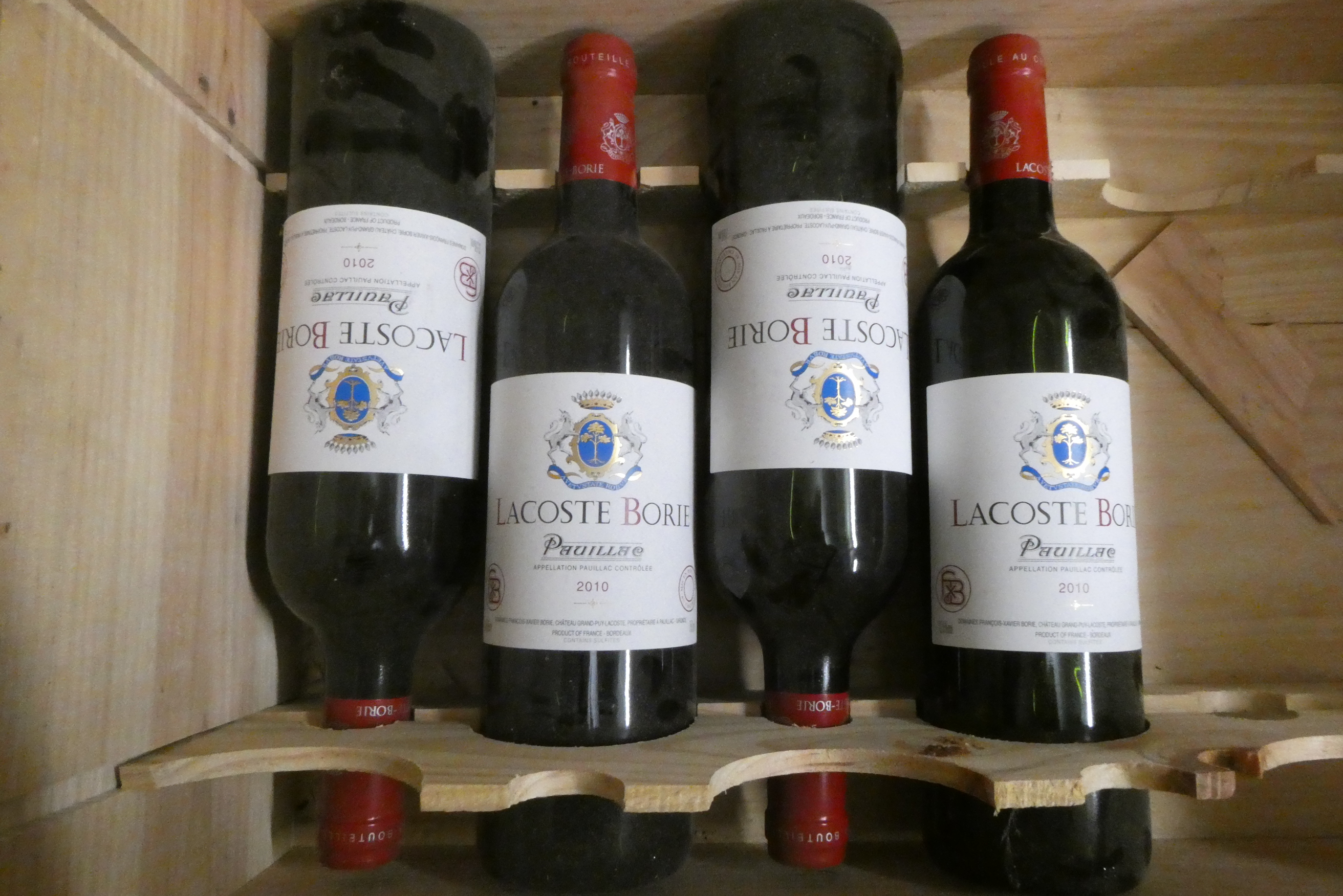 Four bottles Lacoste Borie, 2010, Pauillac, OWC (Est. plus 24% premium inc. VAT) Image