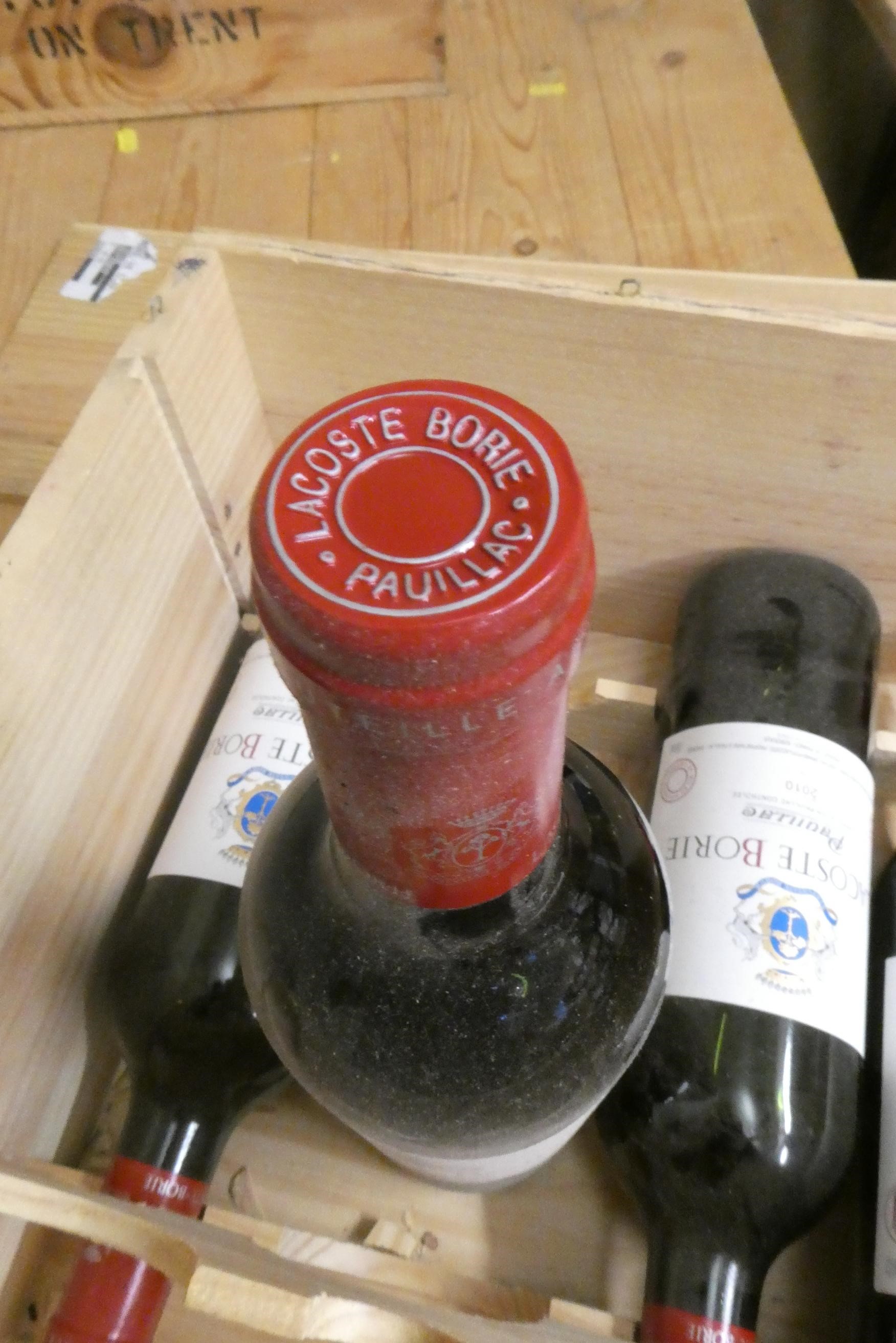 Four bottles Lacoste Borie, 2010, Pauillac, OWC (Est. plus 24% premium inc. VAT) Image