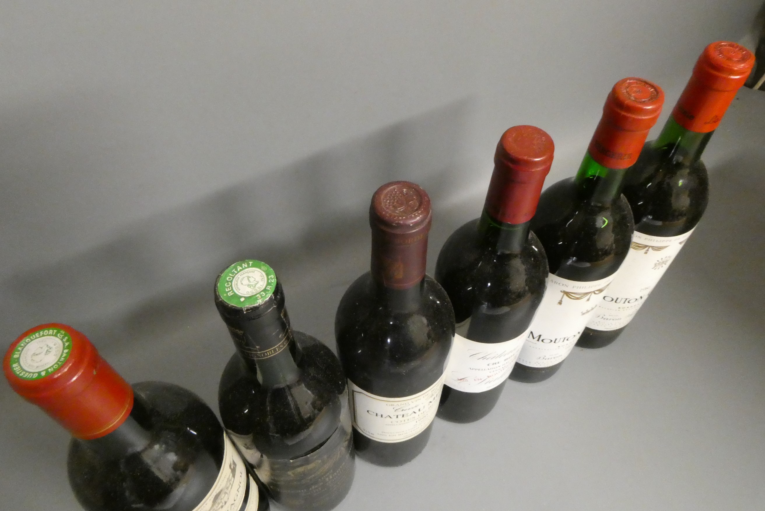 Six bottles of red bordeaux Image