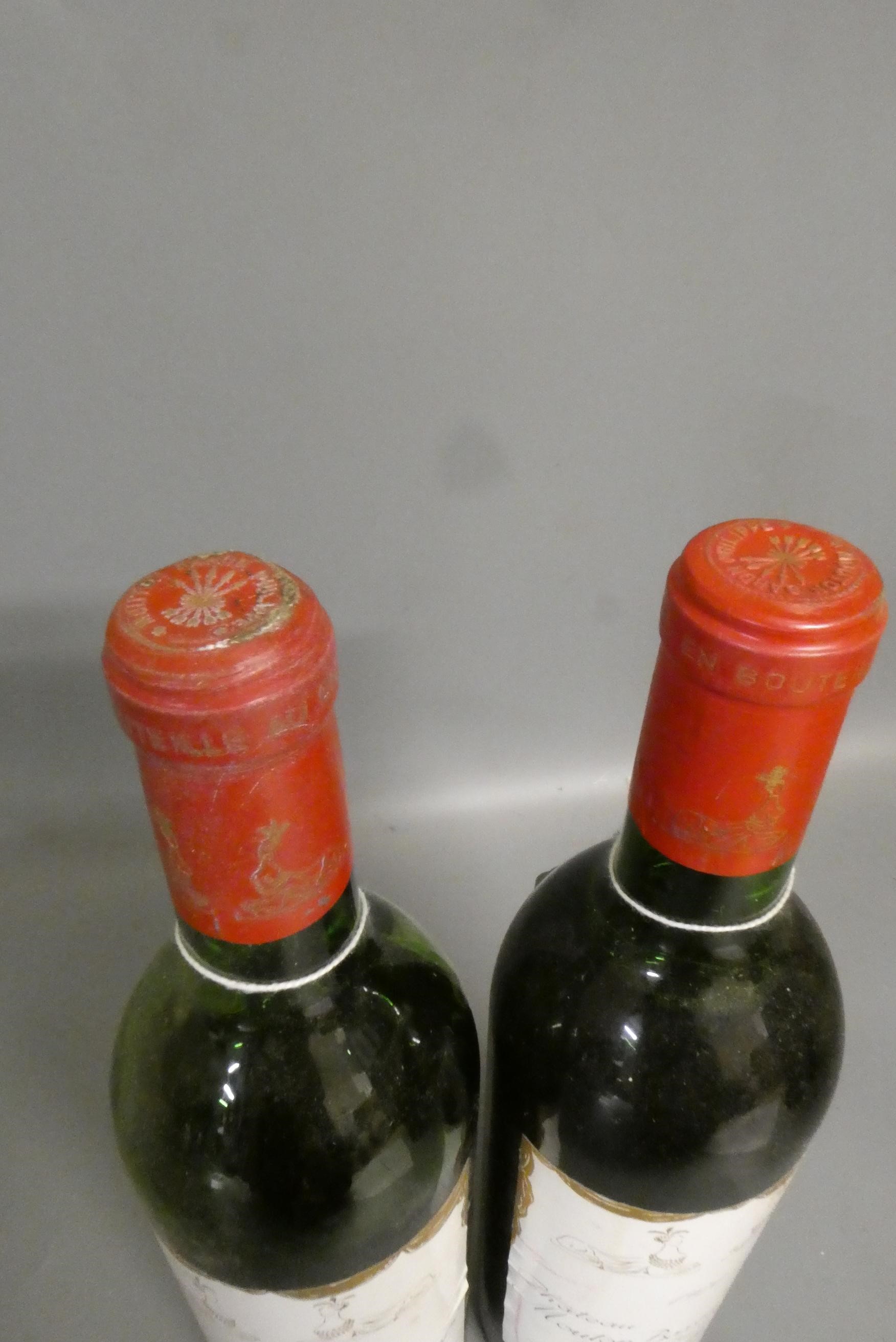 Two bottles Chateau Mouton Baron Phillipe, 1970, pauillac, grand cru classe (Est. plus 24% premium Image