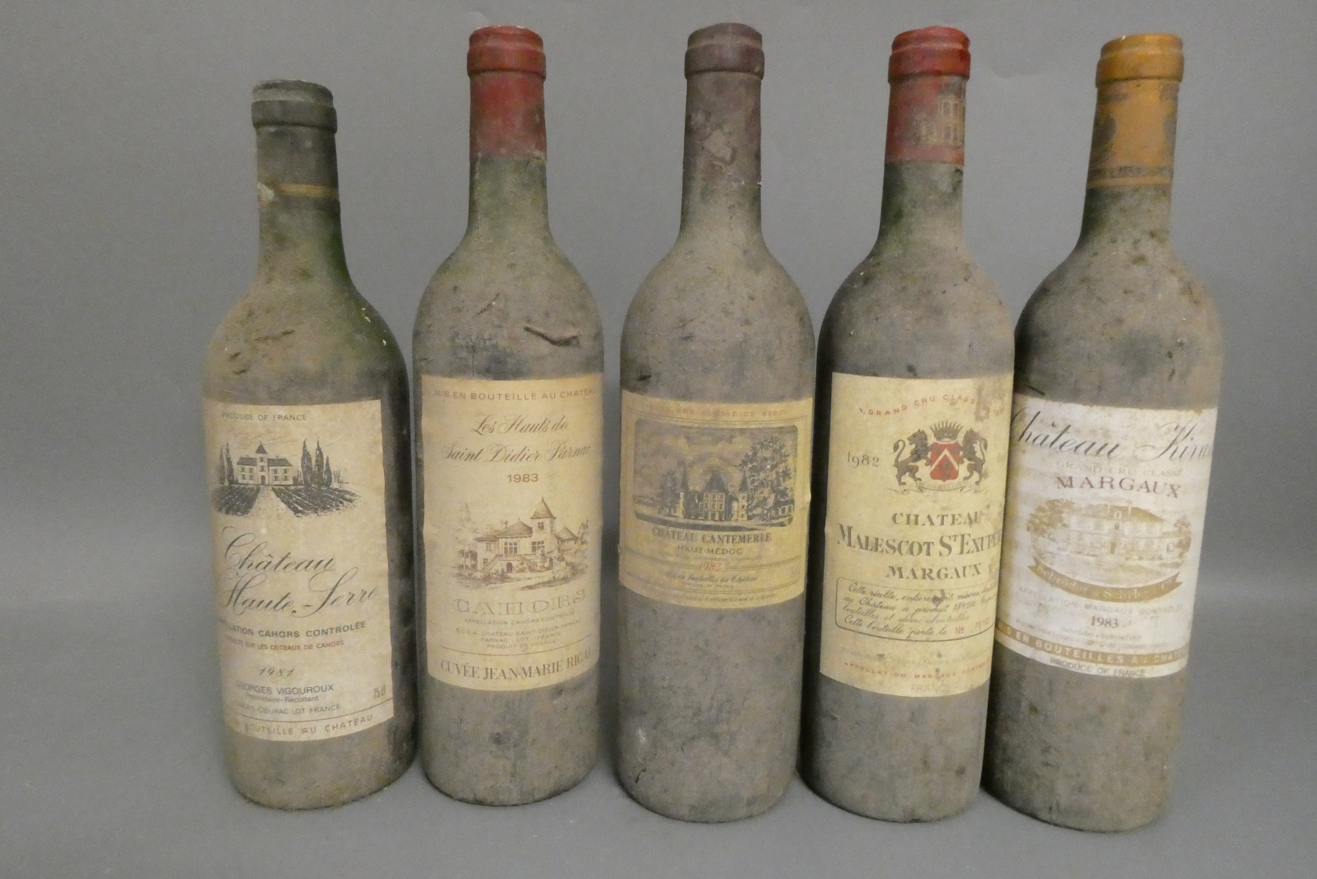 Five bottles of red bordeaux Image