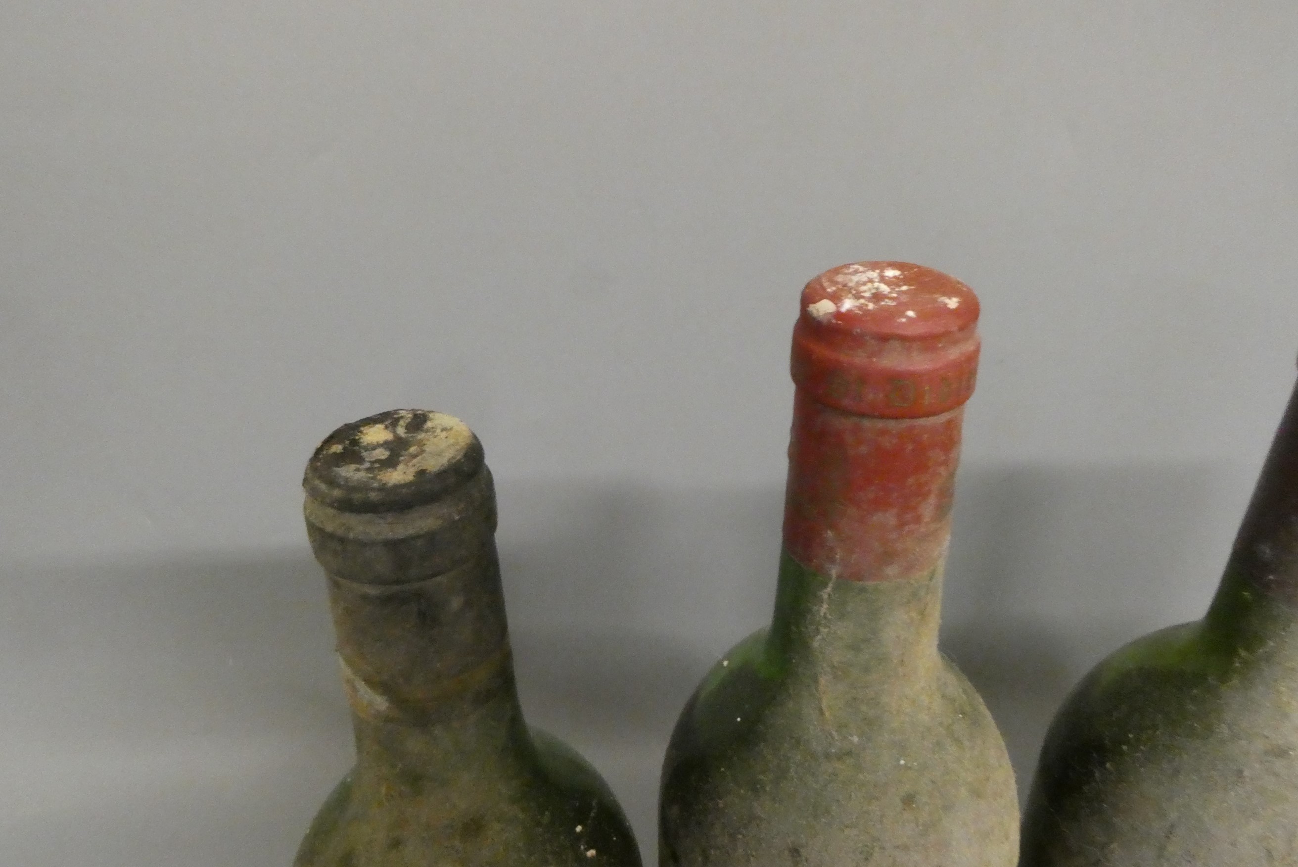 Five bottles of red bordeaux Image