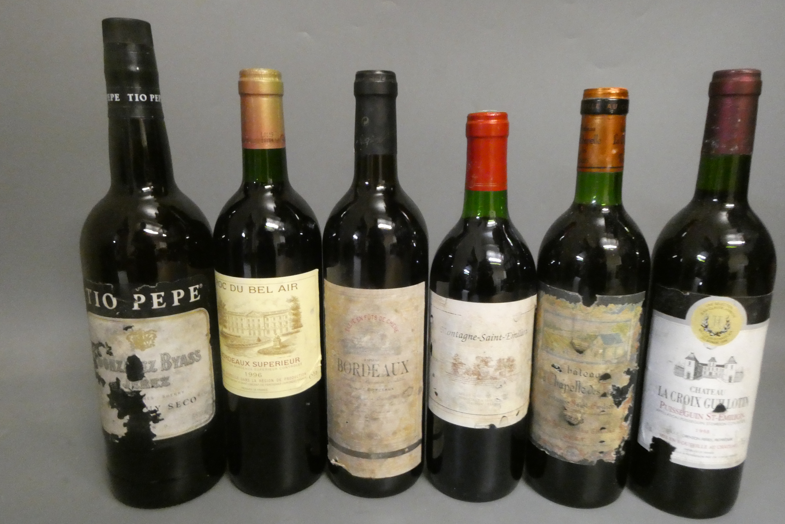 Five bottles of red bordeaux Image