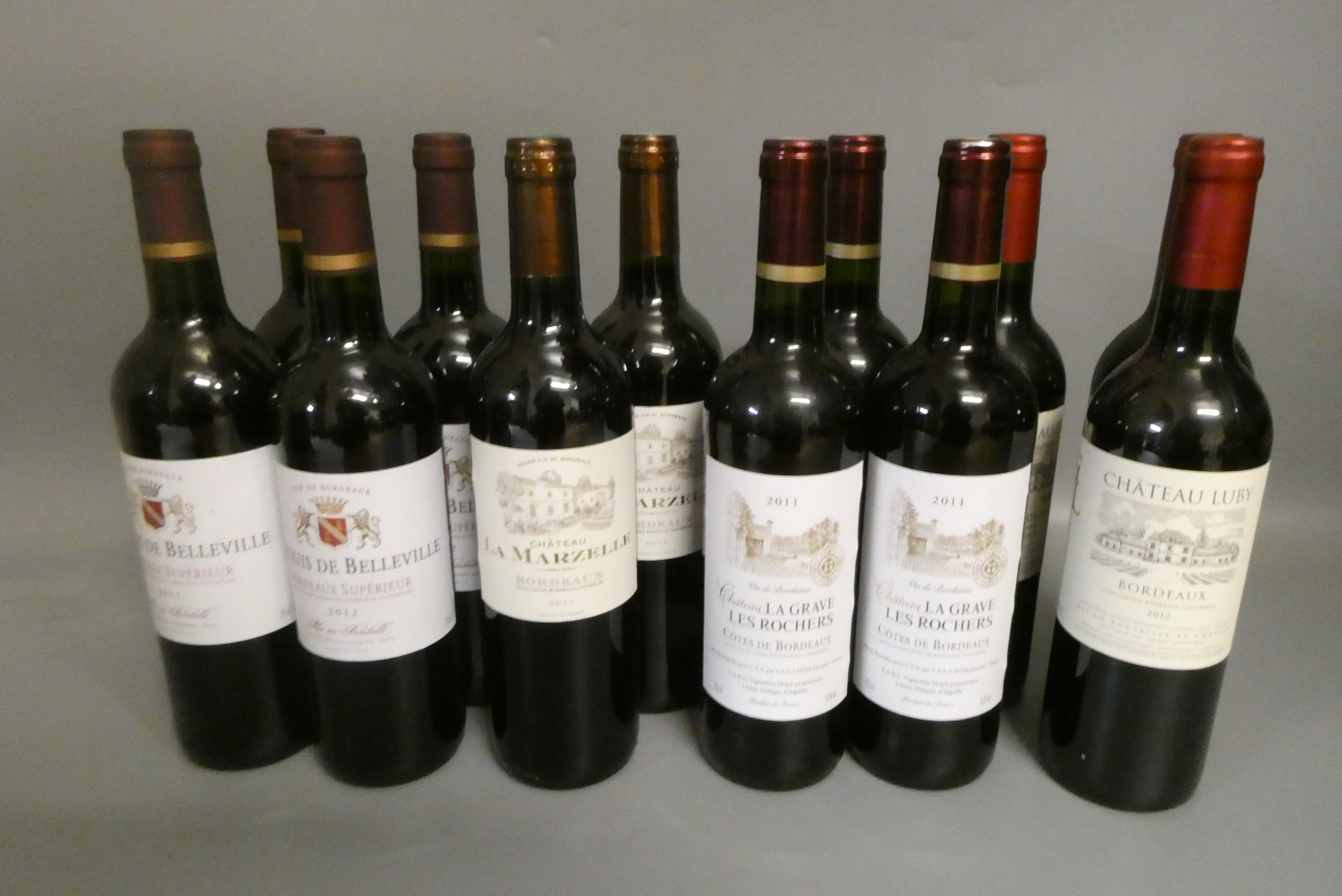 Twelve bottles of red bordeaux Image