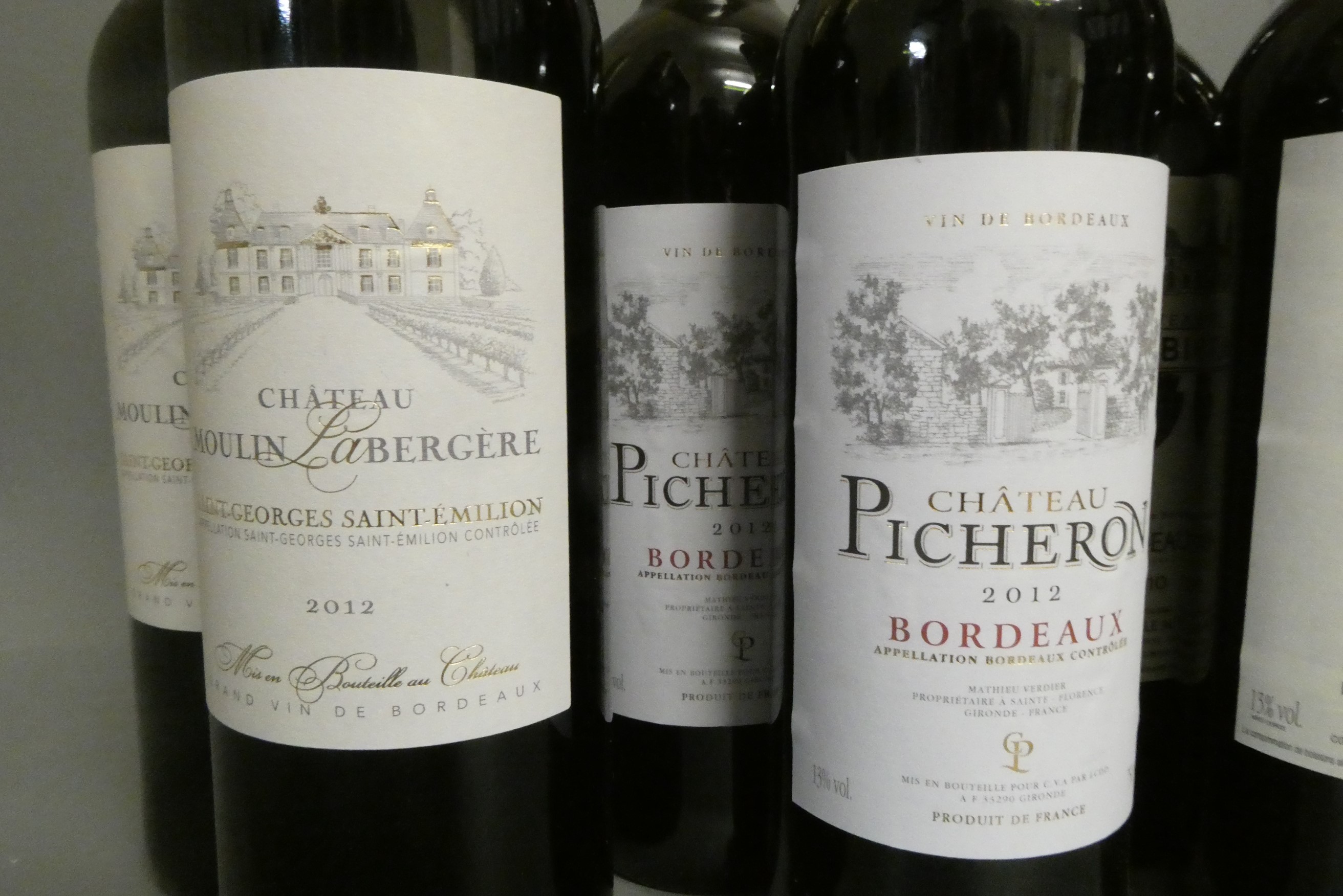 Twelve bottles of red bordeaux Image