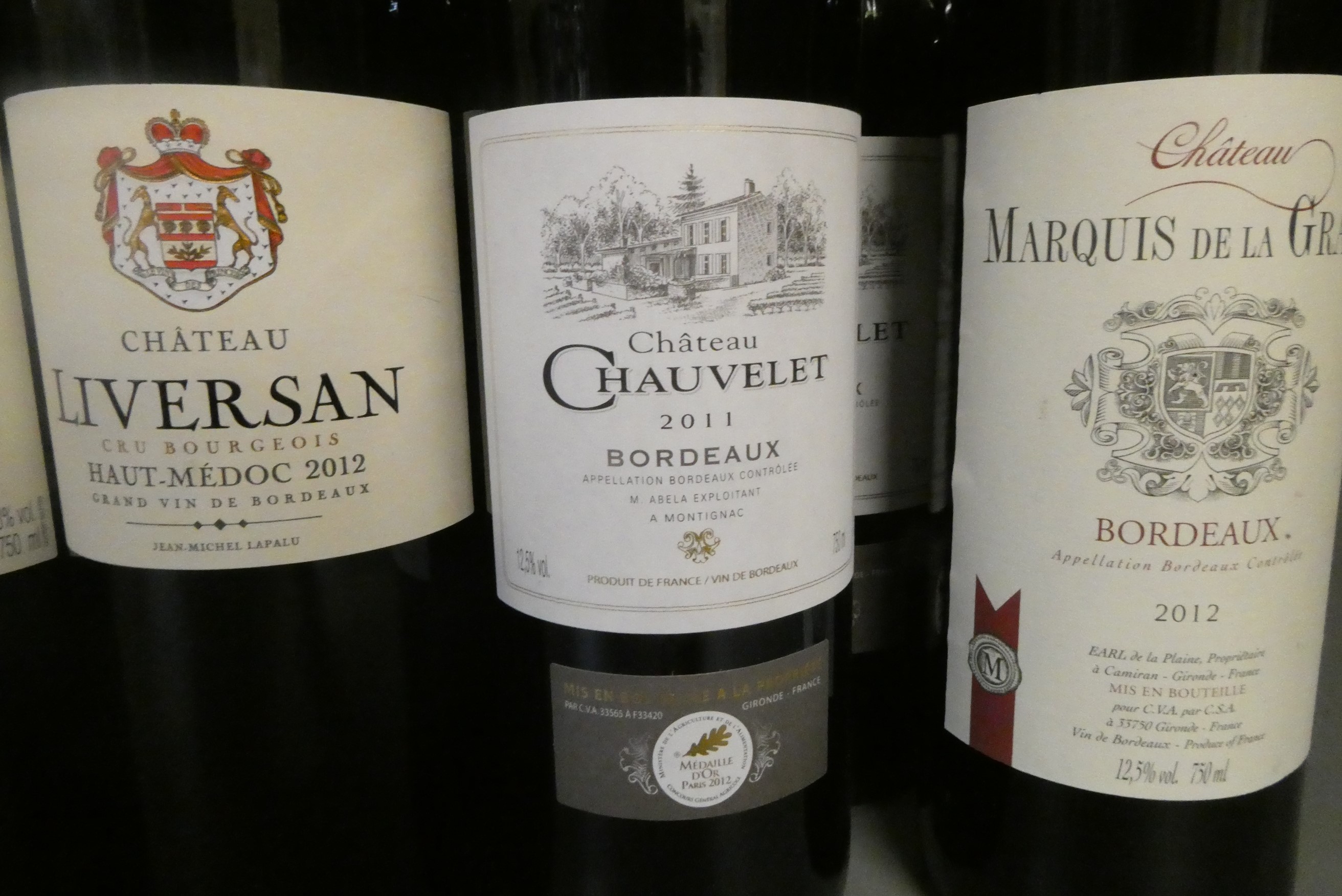 Fifteen bottles of red bordeaux Image