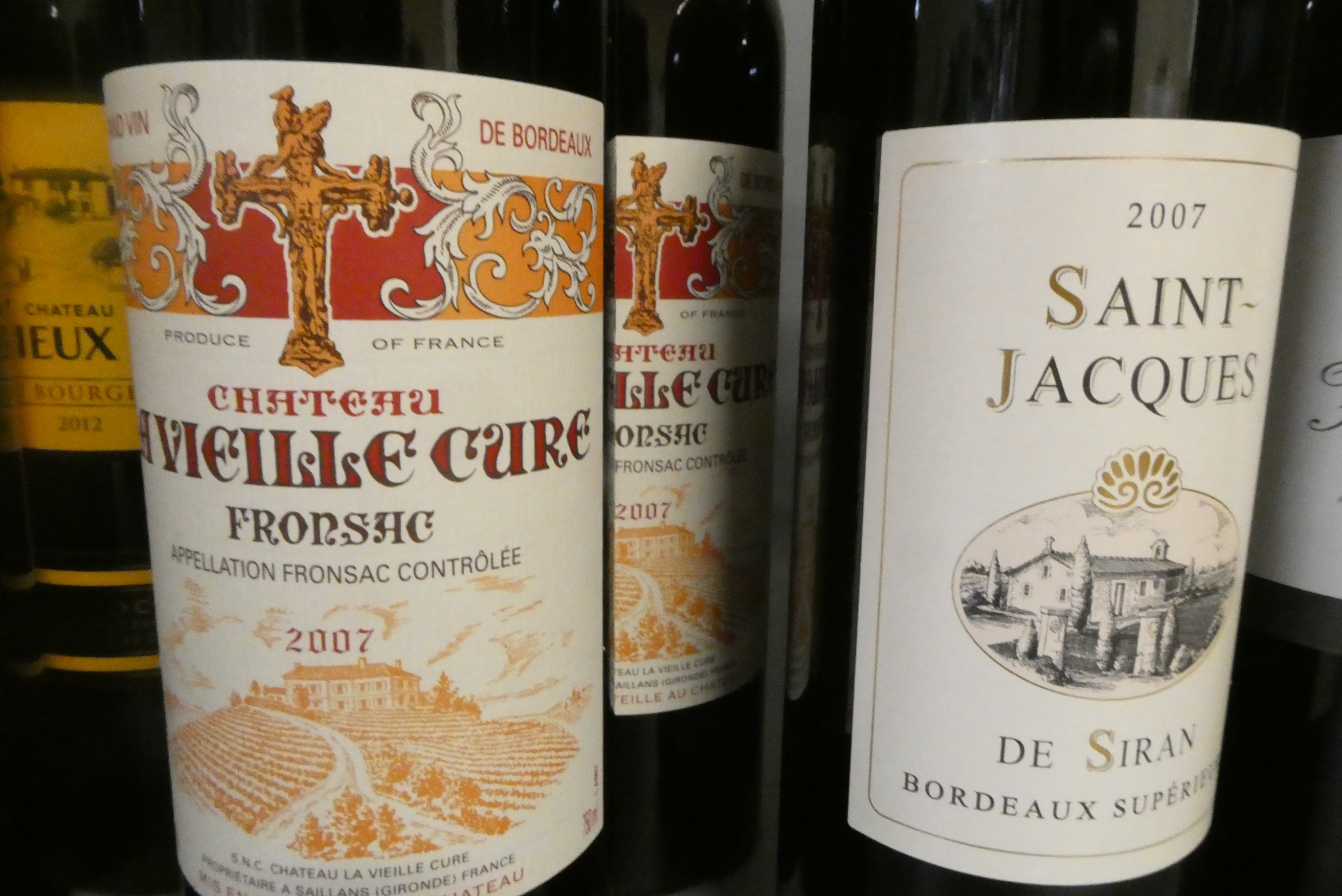 Eleven bottles of red bordeaux Image