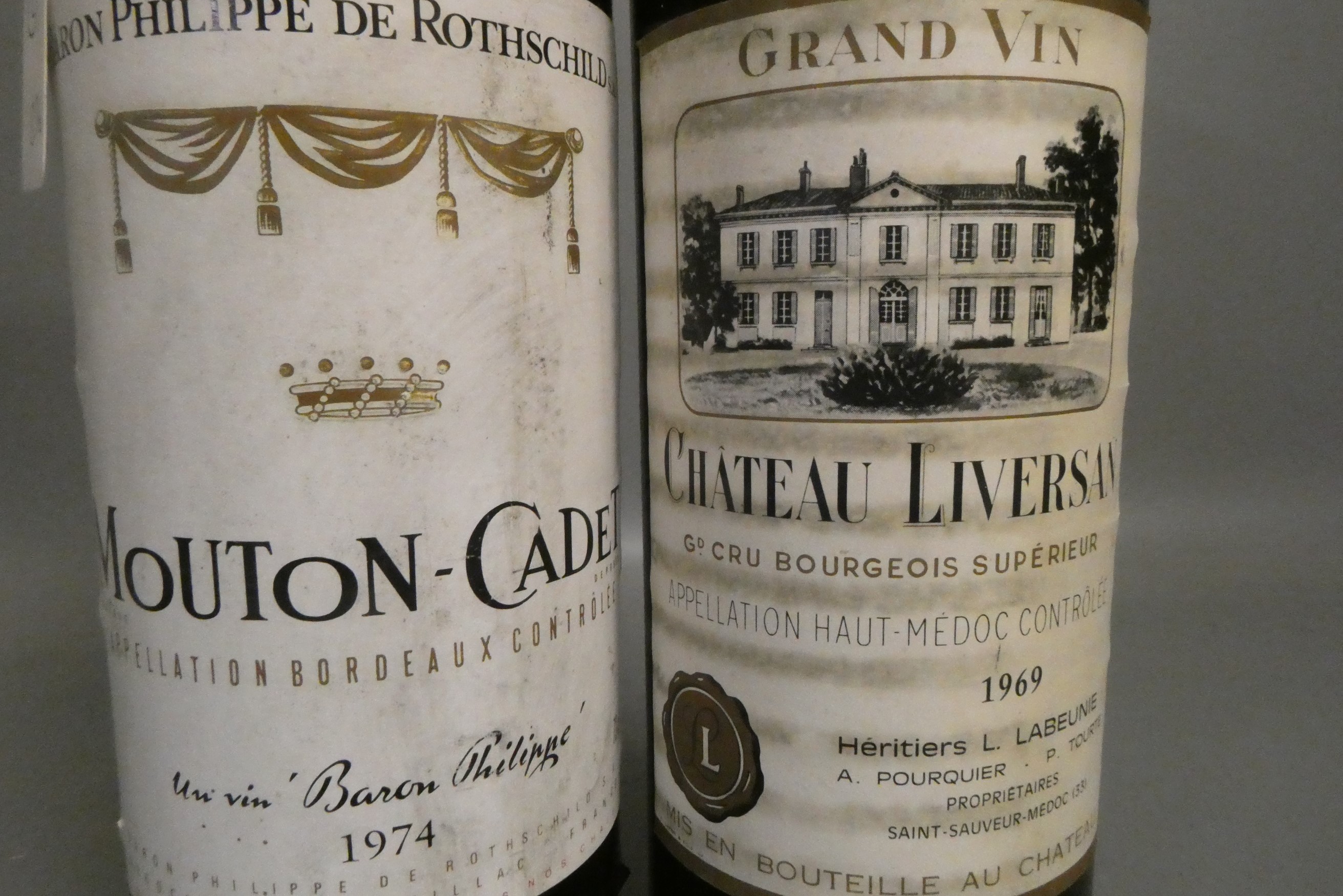 Two bottles of red bordeaux, comprising a Chateau Liversan 1969 grand vin, and a Mouton-Cadet 1974, Image