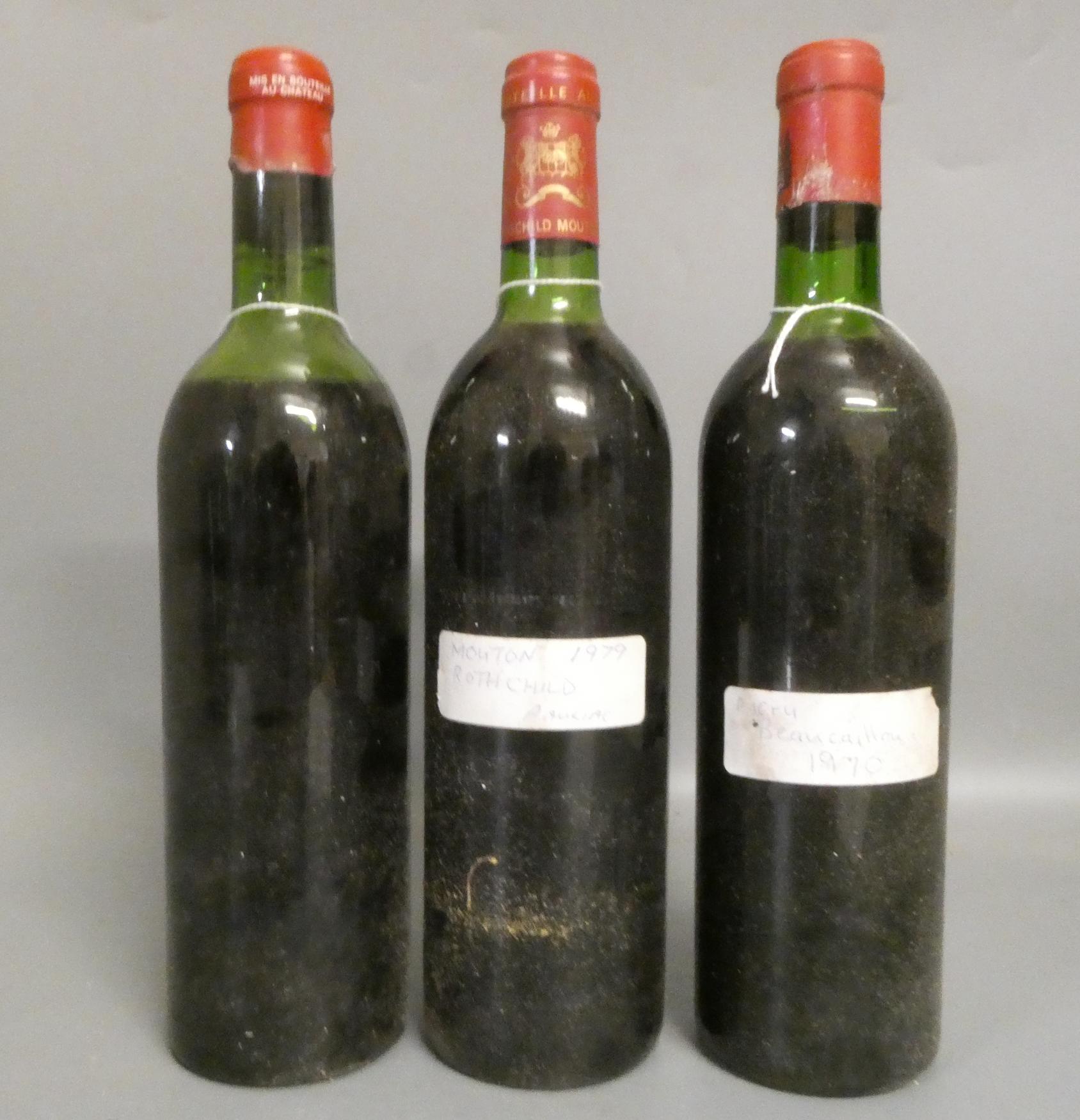 Three bottles of red Bordeaux, comprising a Mouton Rothschild pauillac presumed 1979, a Ducru Image