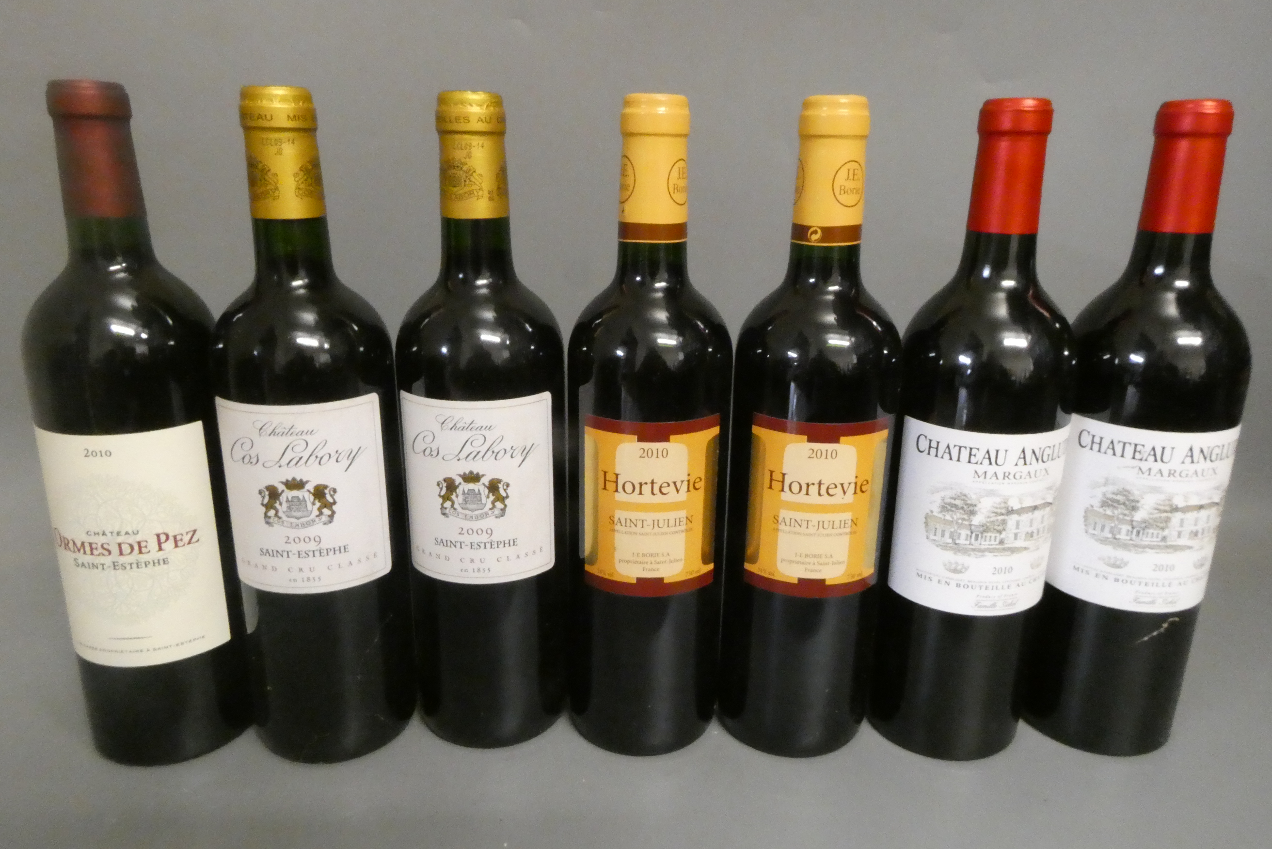 Seven bottles of Bordeaux Image