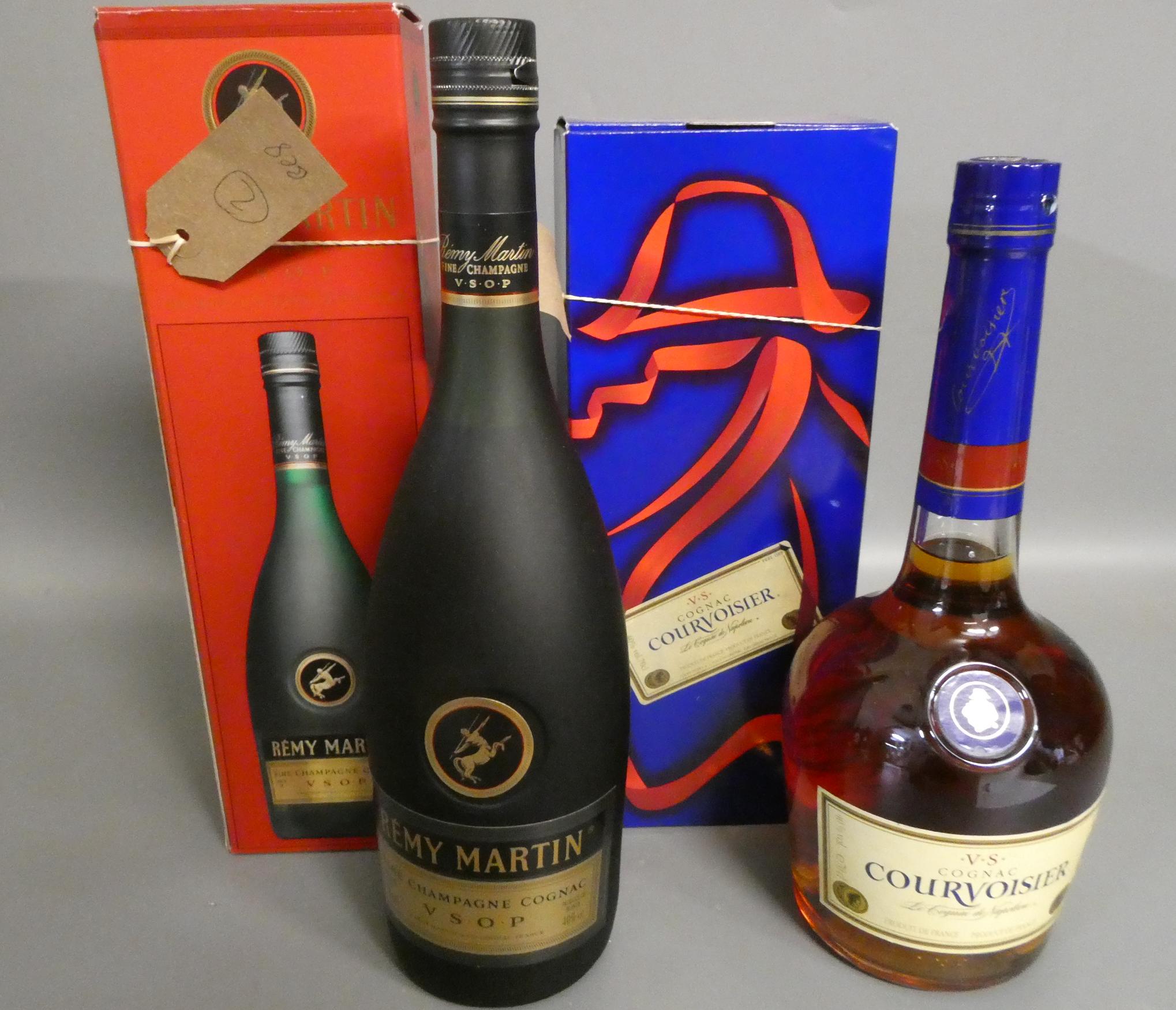 Two boxed bottles cognac, comprising a Remy Martin VSOP and a Courvoisier VS (Est. plus 24% premium Image