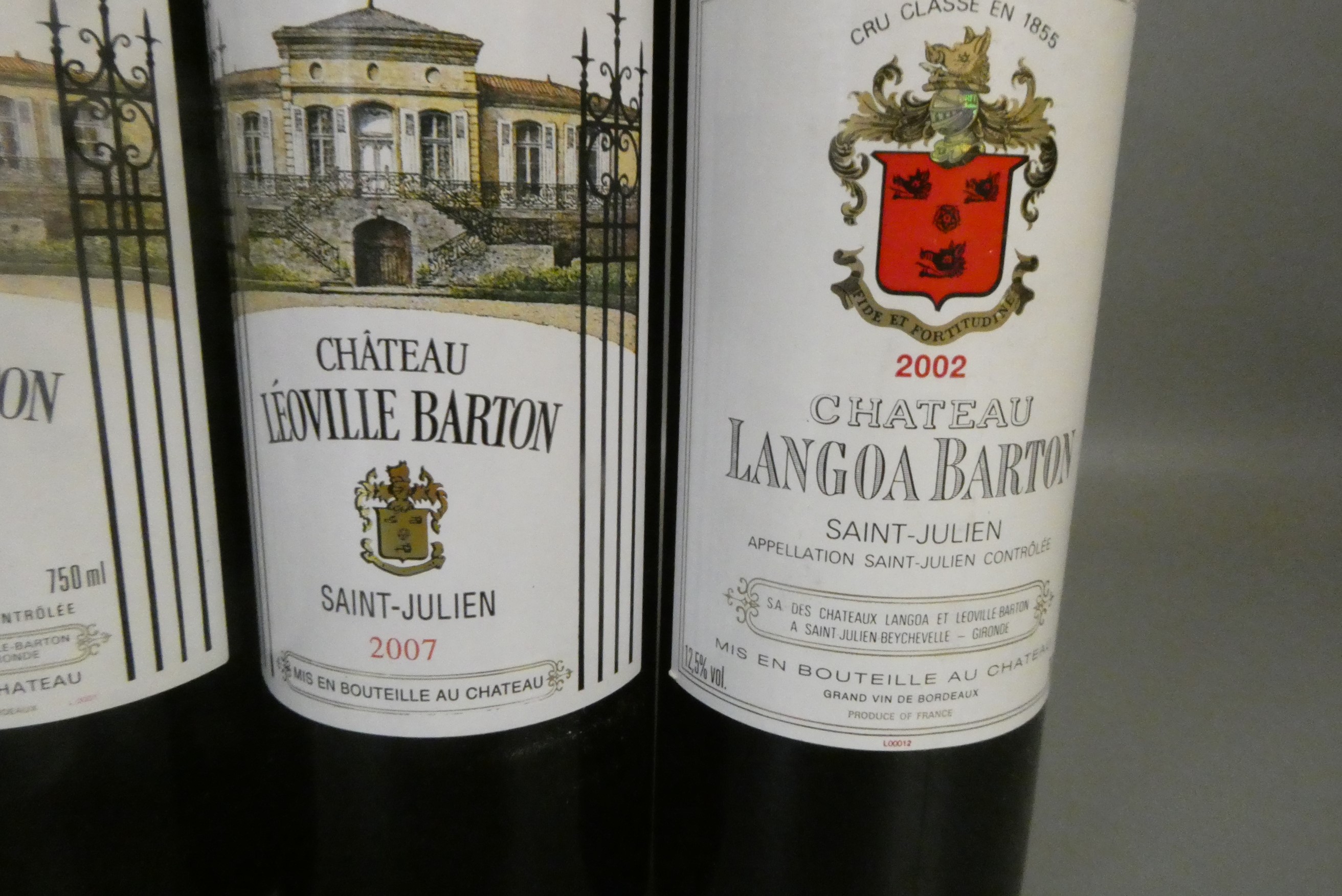 Three bottles Saint-Julien, comprising one 2001 and one 2007 Chateau Leoville Barton, and a 2002 Image