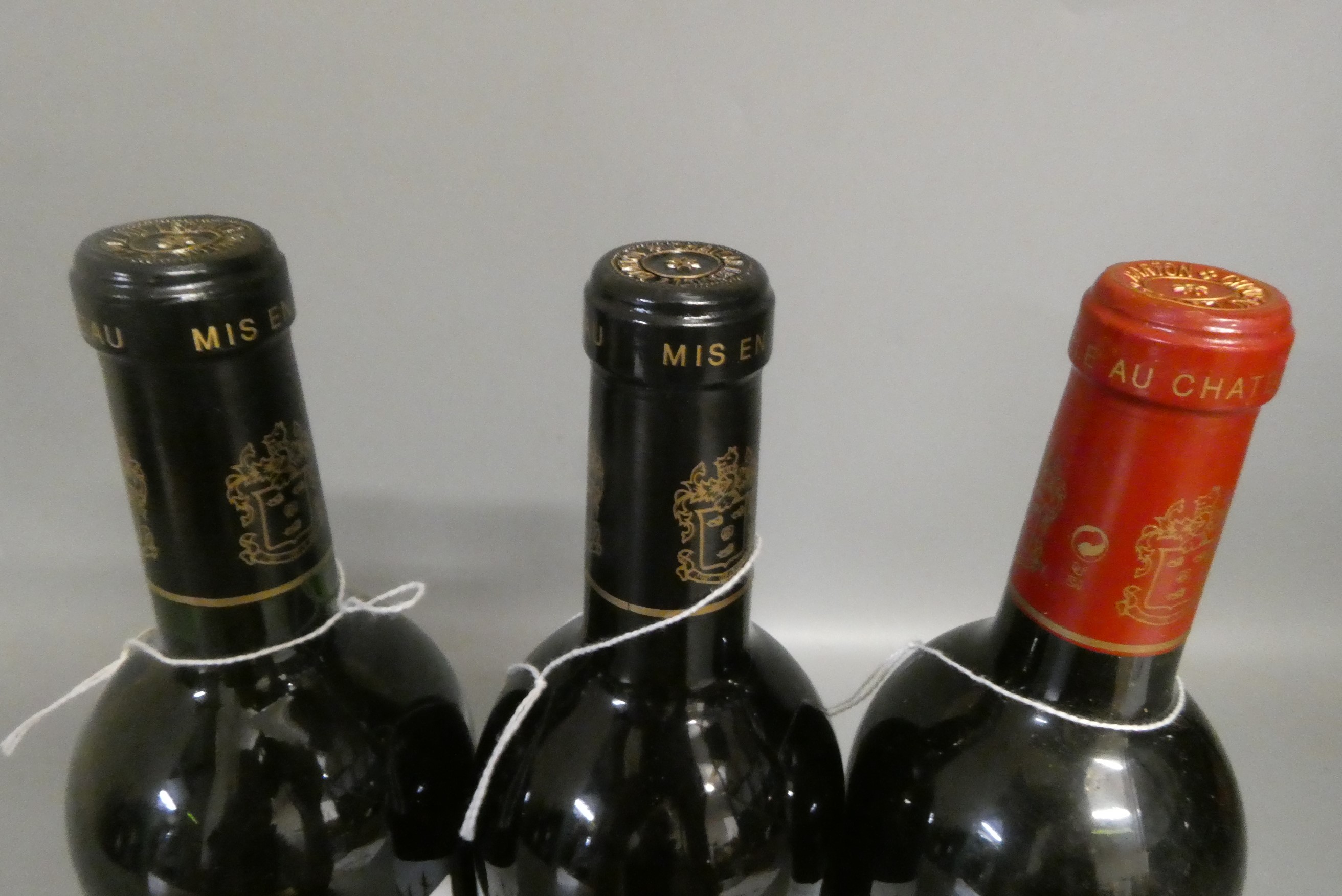 Three bottles Saint-Julien, comprising one 2001 and one 2007 Chateau Leoville Barton, and a 2002 Image