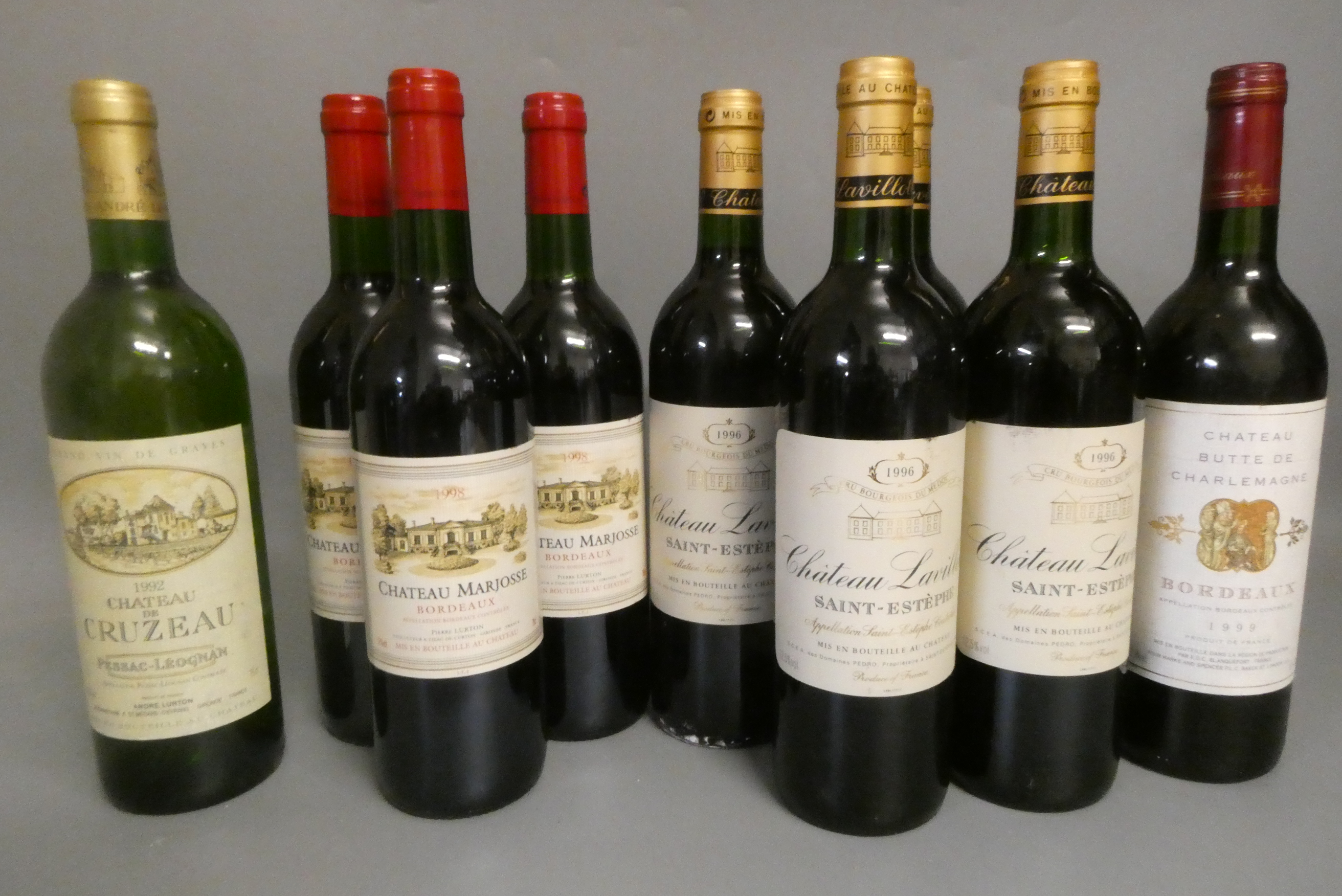 Nine bottles of Bordeaux Image