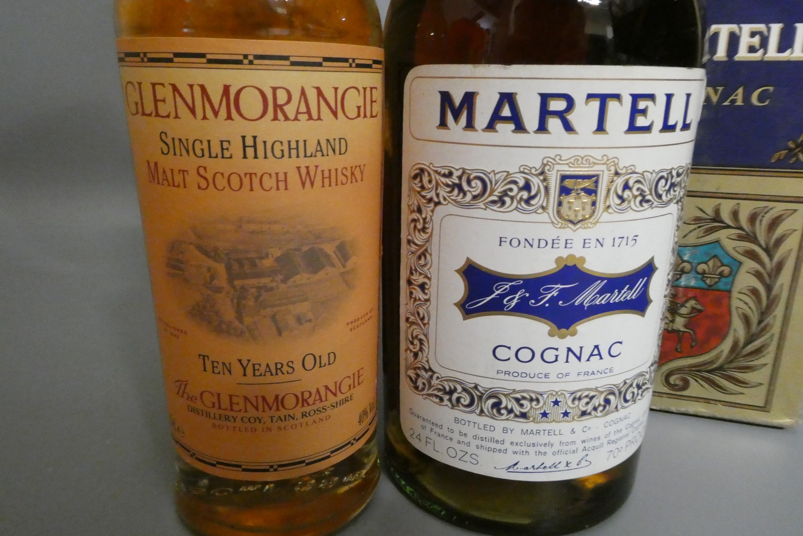 One Martell three star cognac, boxed, 24 fl. ozs., together with a 35cl 10yr old Glenmorangie single Image