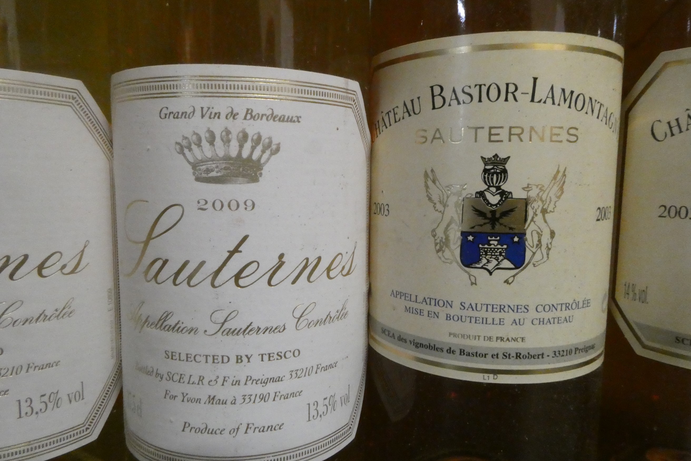 Five half bottles Sauternes, comprising three 2003 Chateau Bastor-Lamontagne and two 2009 Sauternes Image
