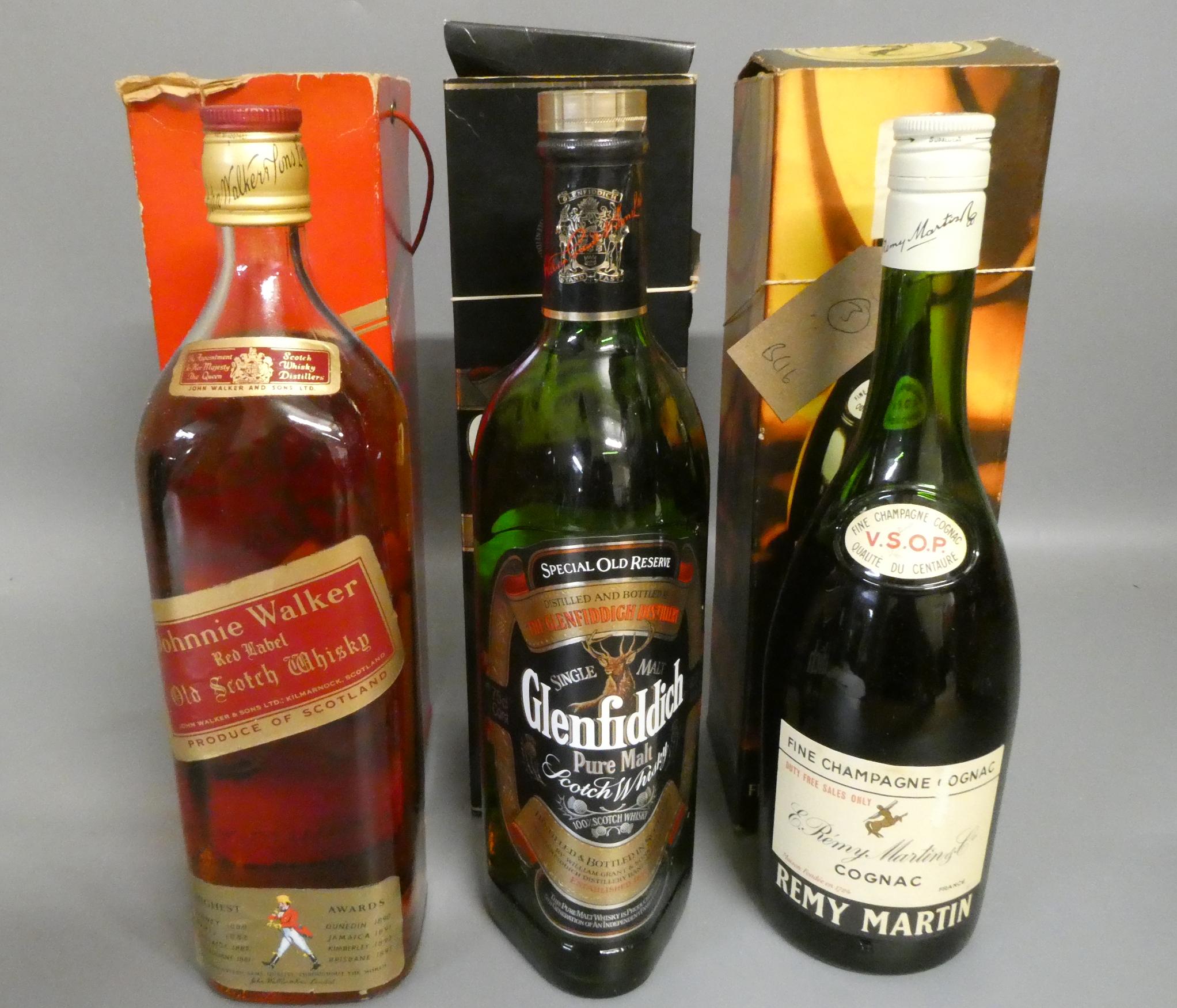 One bottle Remy Martin VSOP Fine Champagne Cognac, vitnage boxed, together with a boxed Glenfiddich Image