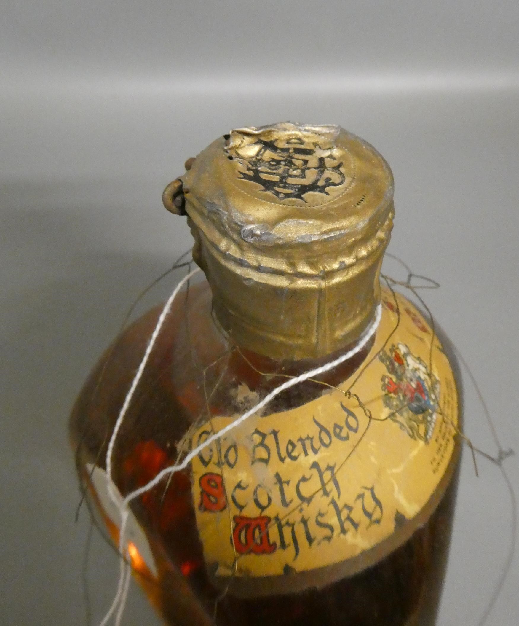 Vintage bottle of Dimple Haig whisky, with snap cap top, 20.4cm tall (Est. plus 24% premium inc. Image