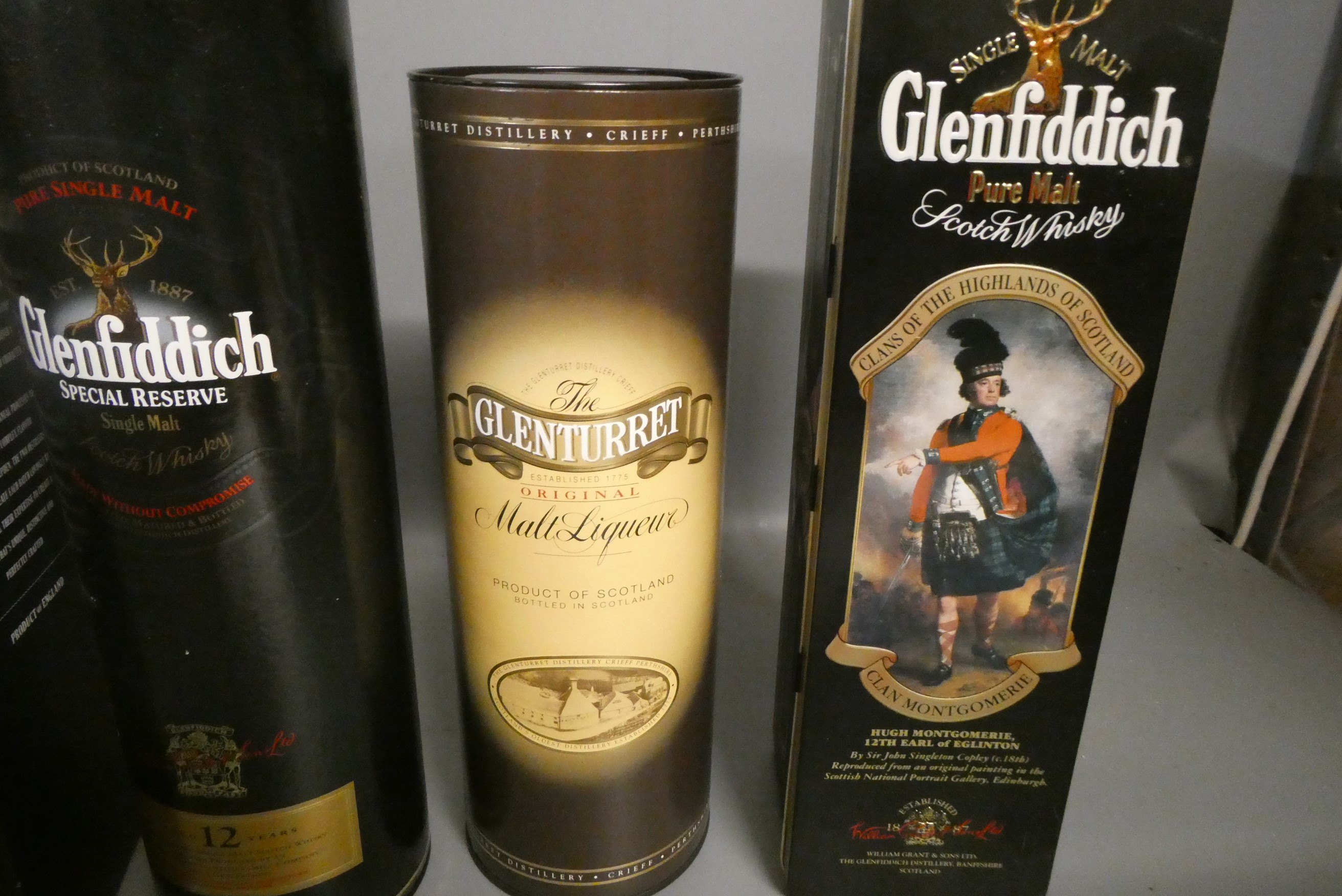 Three bottles of Glenfiddich malt whisky Image