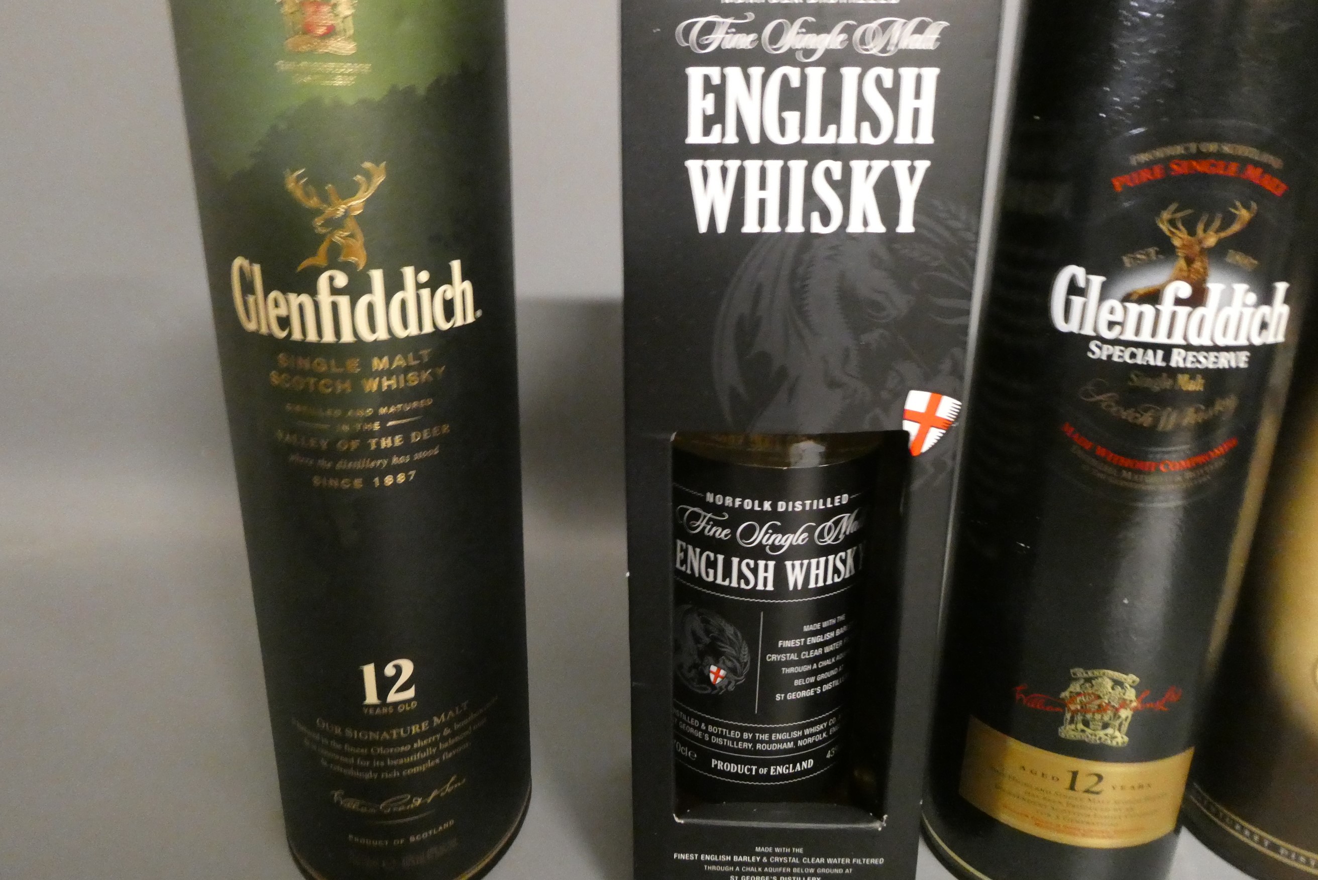 Three bottles of Glenfiddich malt whisky Image