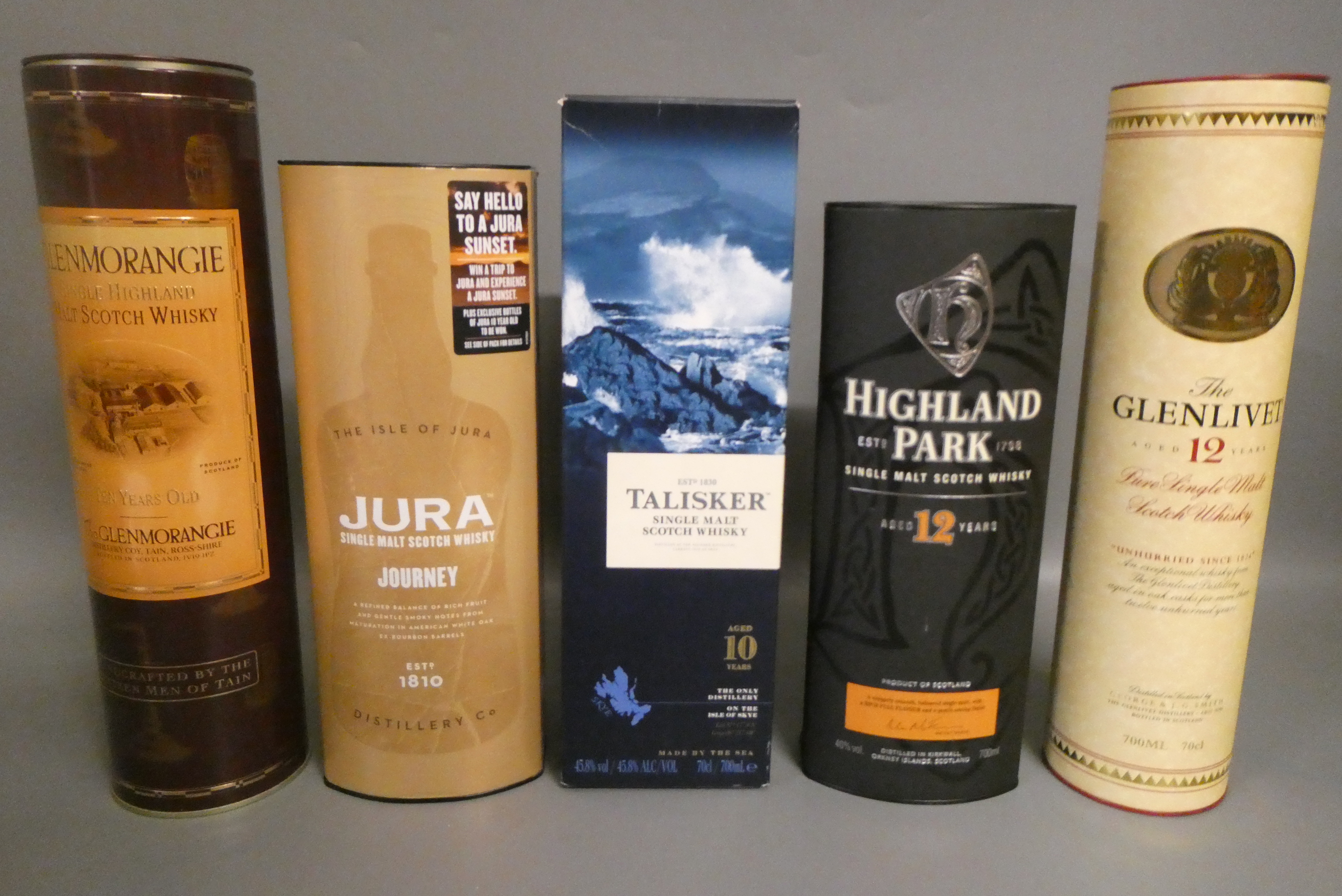 Five boxed bottles of single malt scotch whisky, comprising one Jura Journey, Highland Park 12yr Image