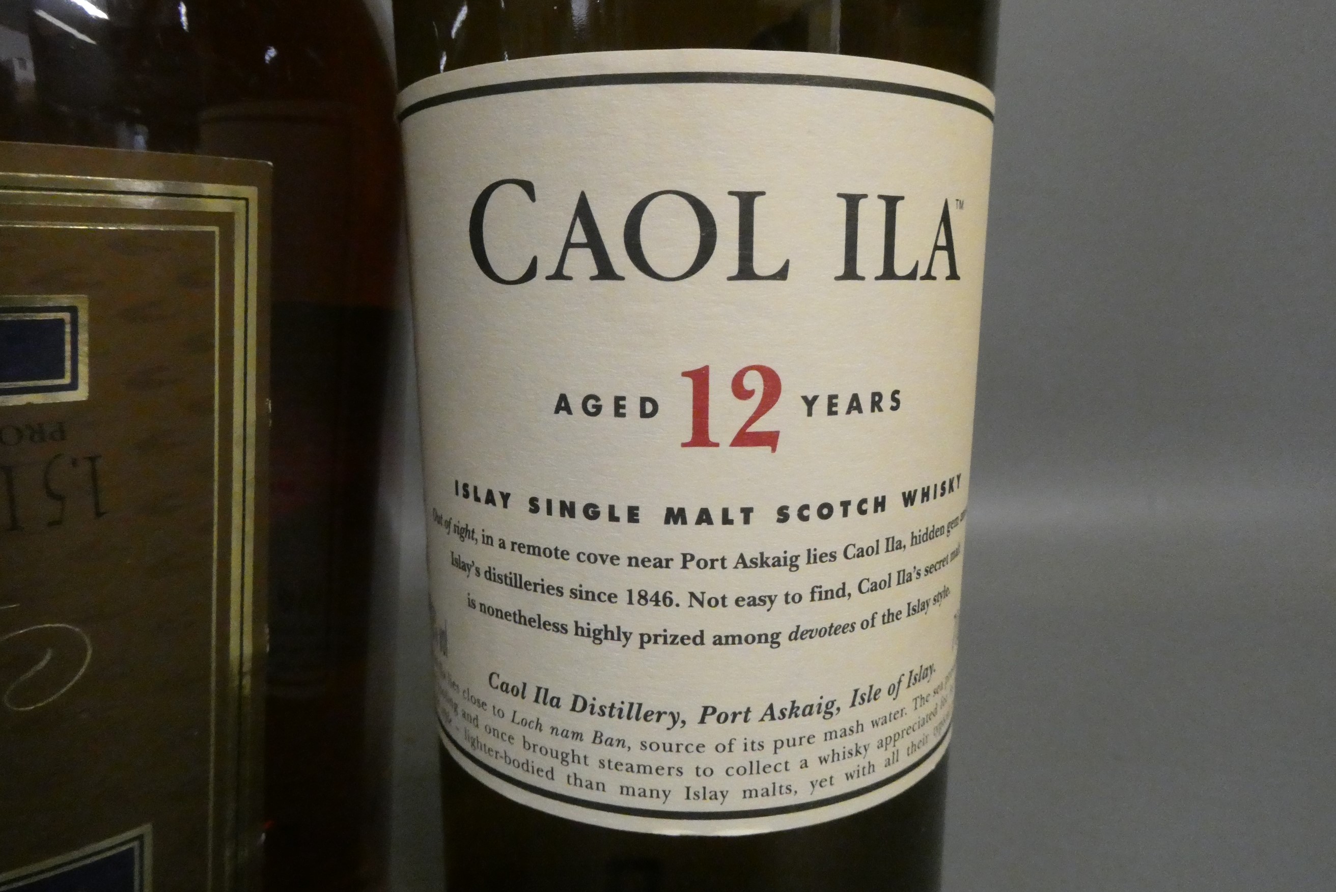 Two bottles of spirit, comprising a 70cl Caol Ila 12 year old Islay single malt Scotch whisky and a Image