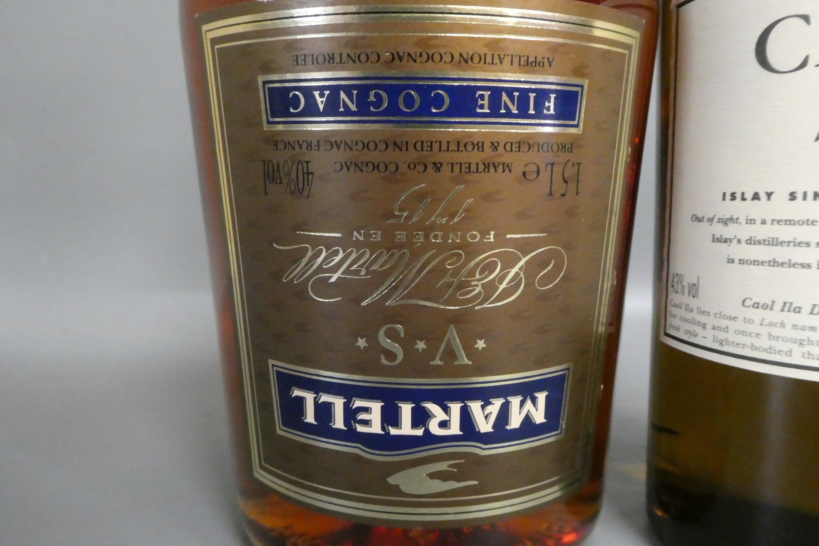 Two bottles of spirit, comprising a 70cl Caol Ila 12 year old Islay single malt Scotch whisky and a Image