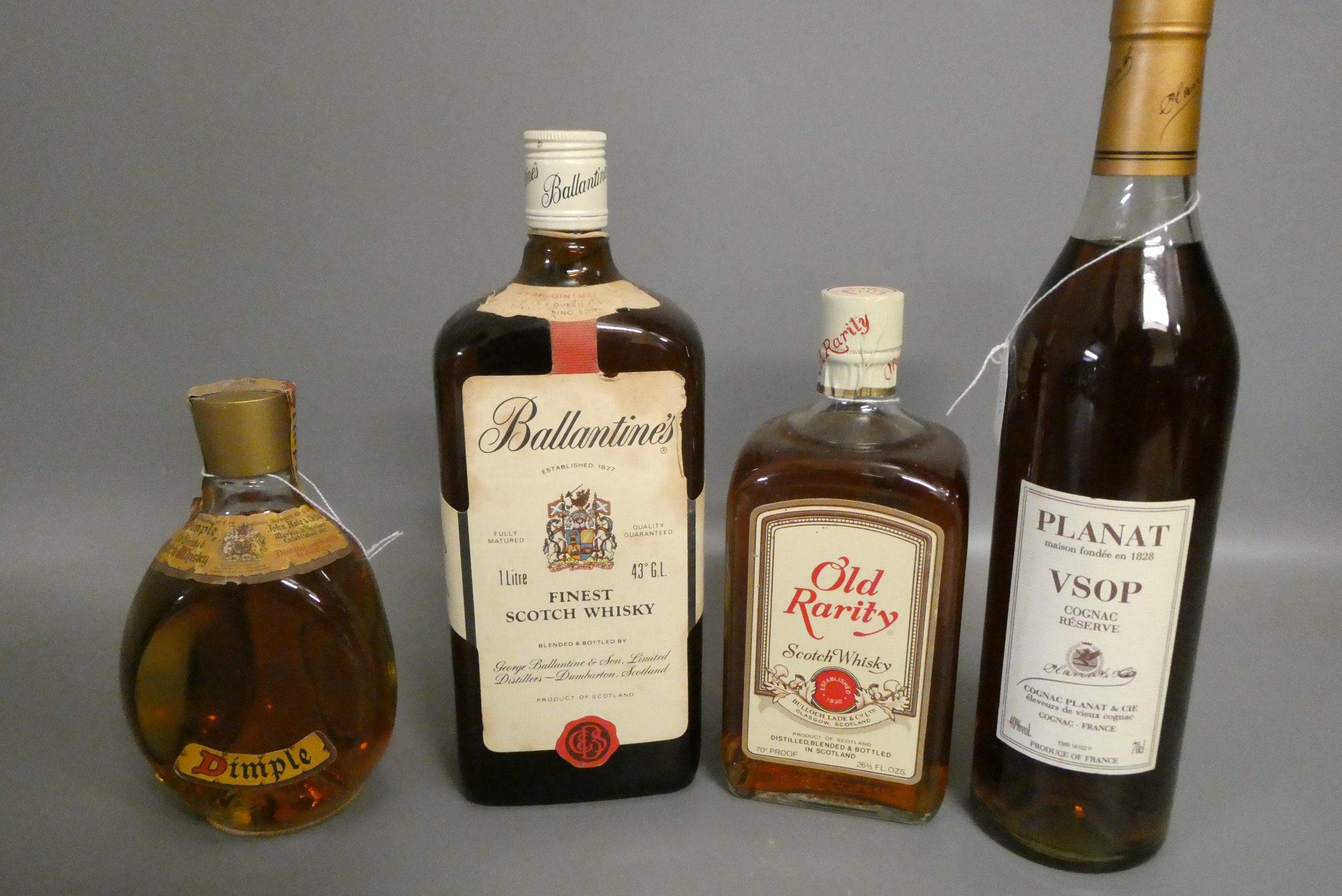 Three bottles of vintage whisky Image