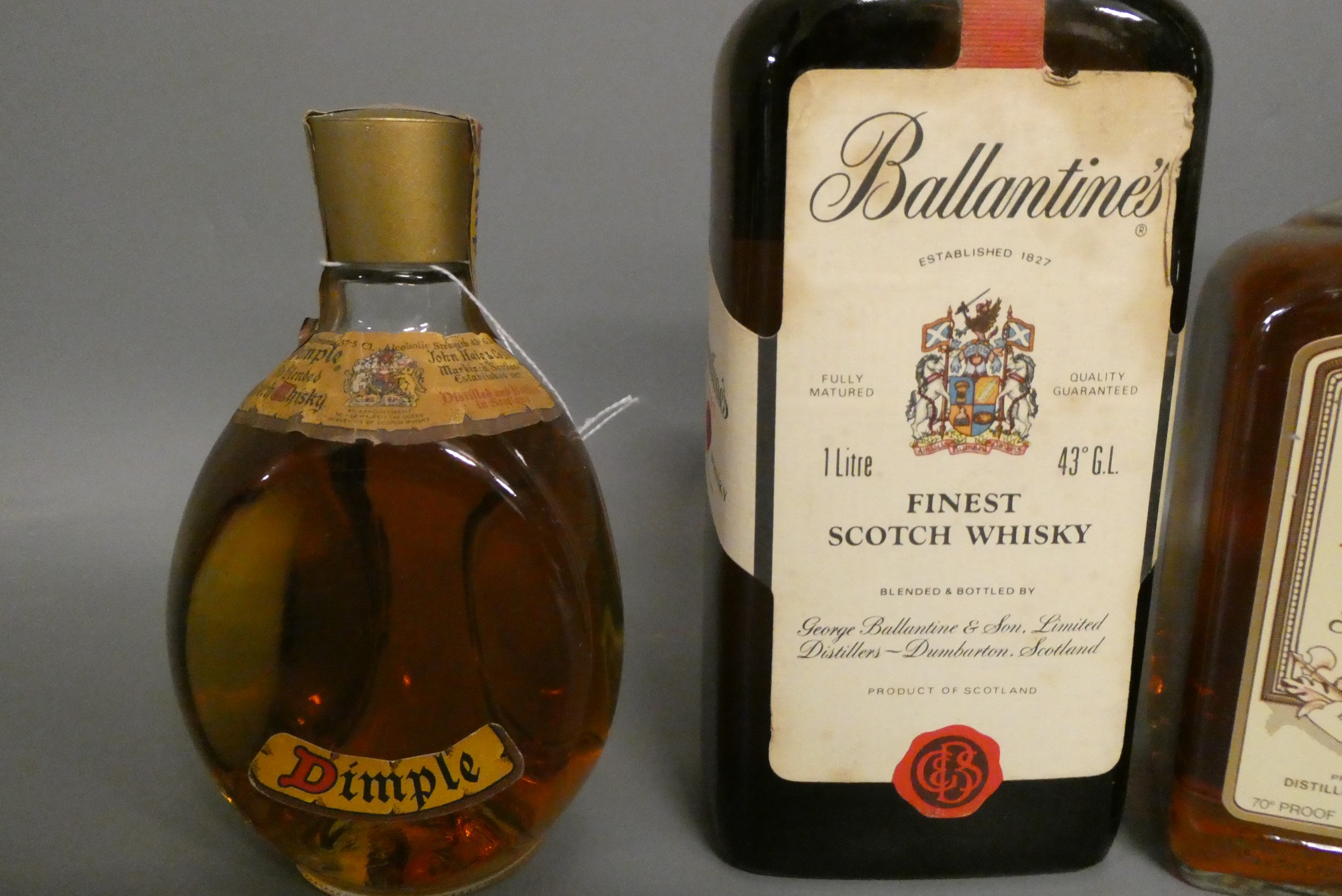 Three bottles of vintage whisky Image