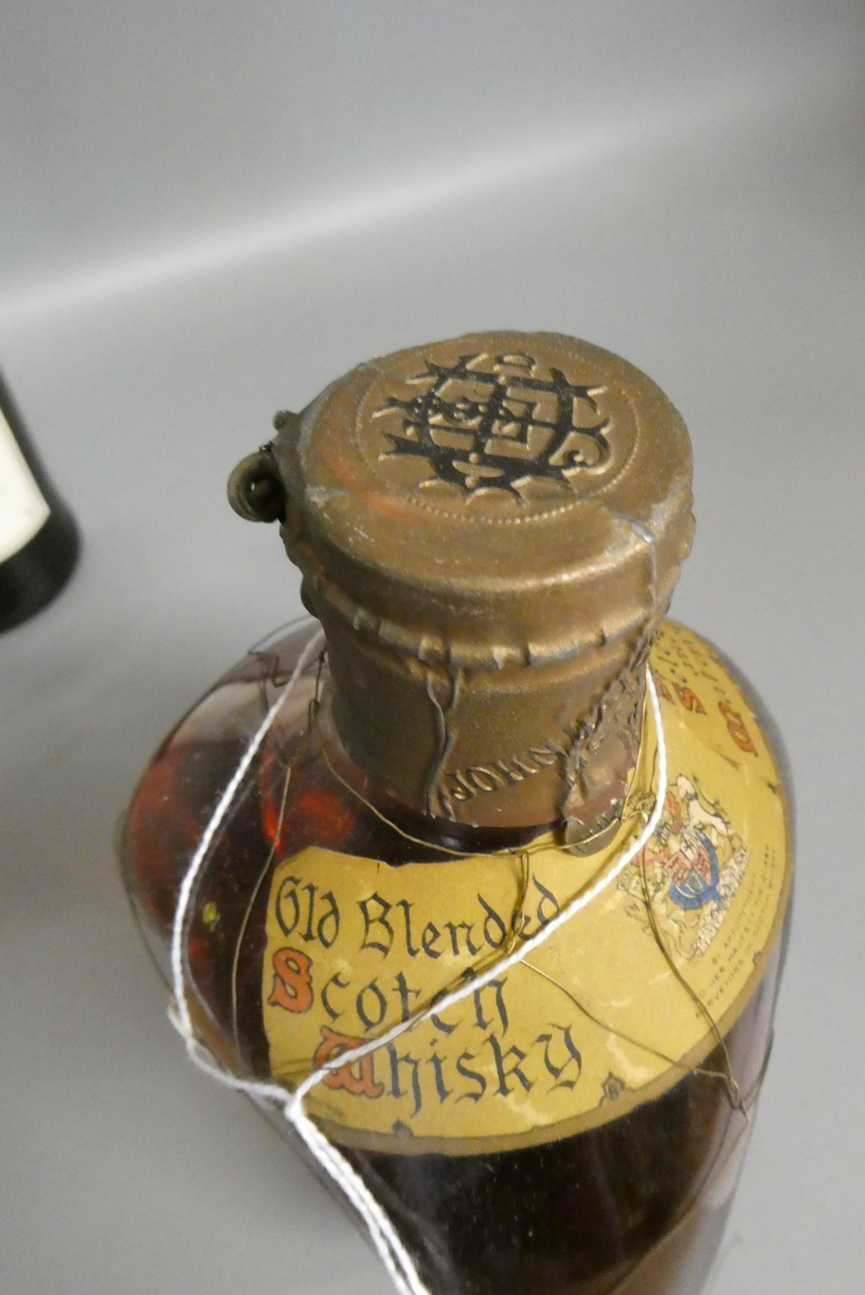 Two bottles of whisky, comprising a 12yr old Famous Grouse 1989 vintage malt whisky, and a Dimble Image