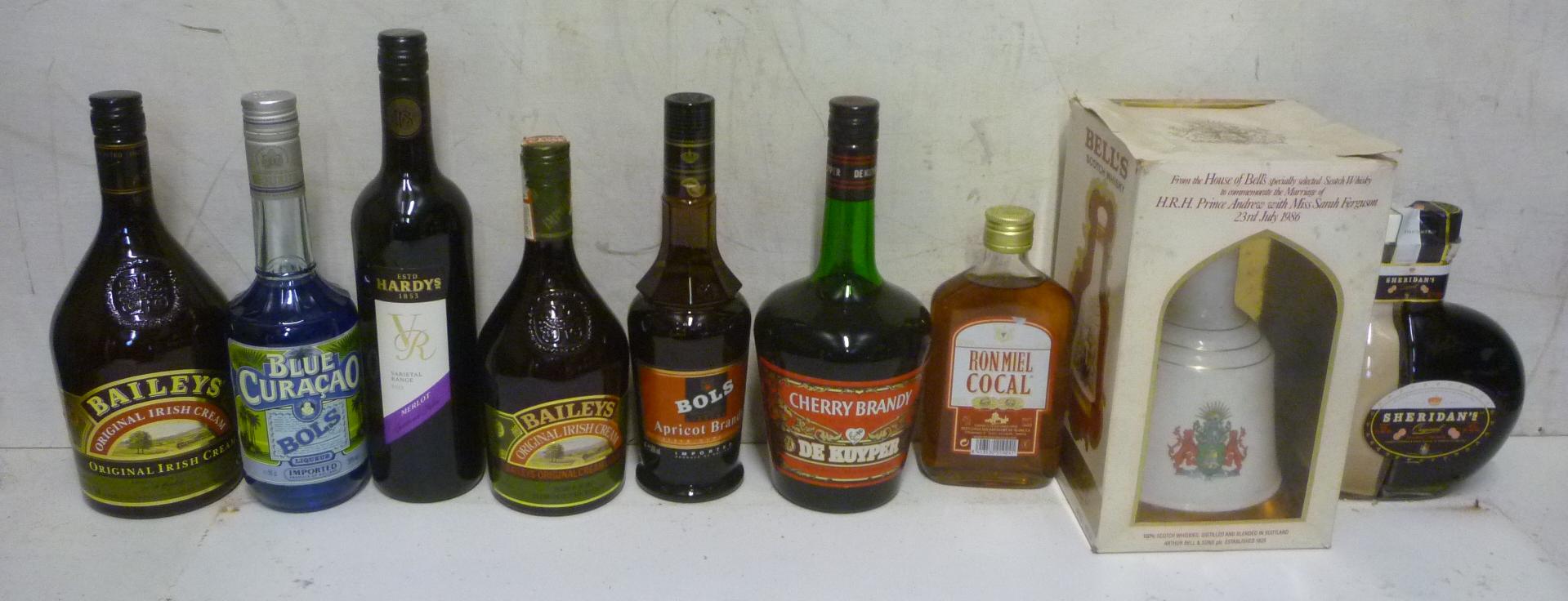 One litre and one bottle Baileys Irish Cream Image