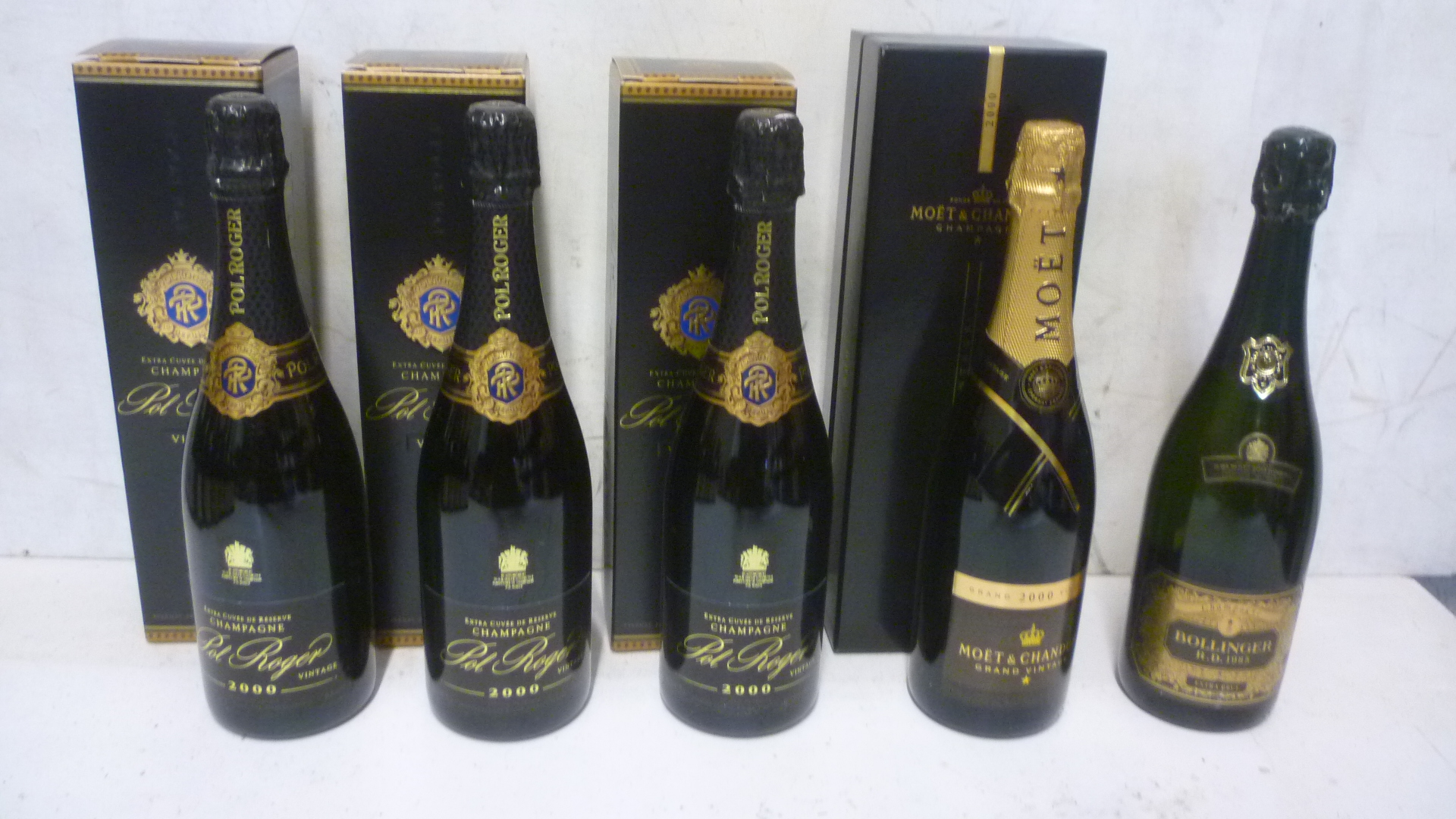 Three bottles 2000 Pol Roger Extra Cuvee Image