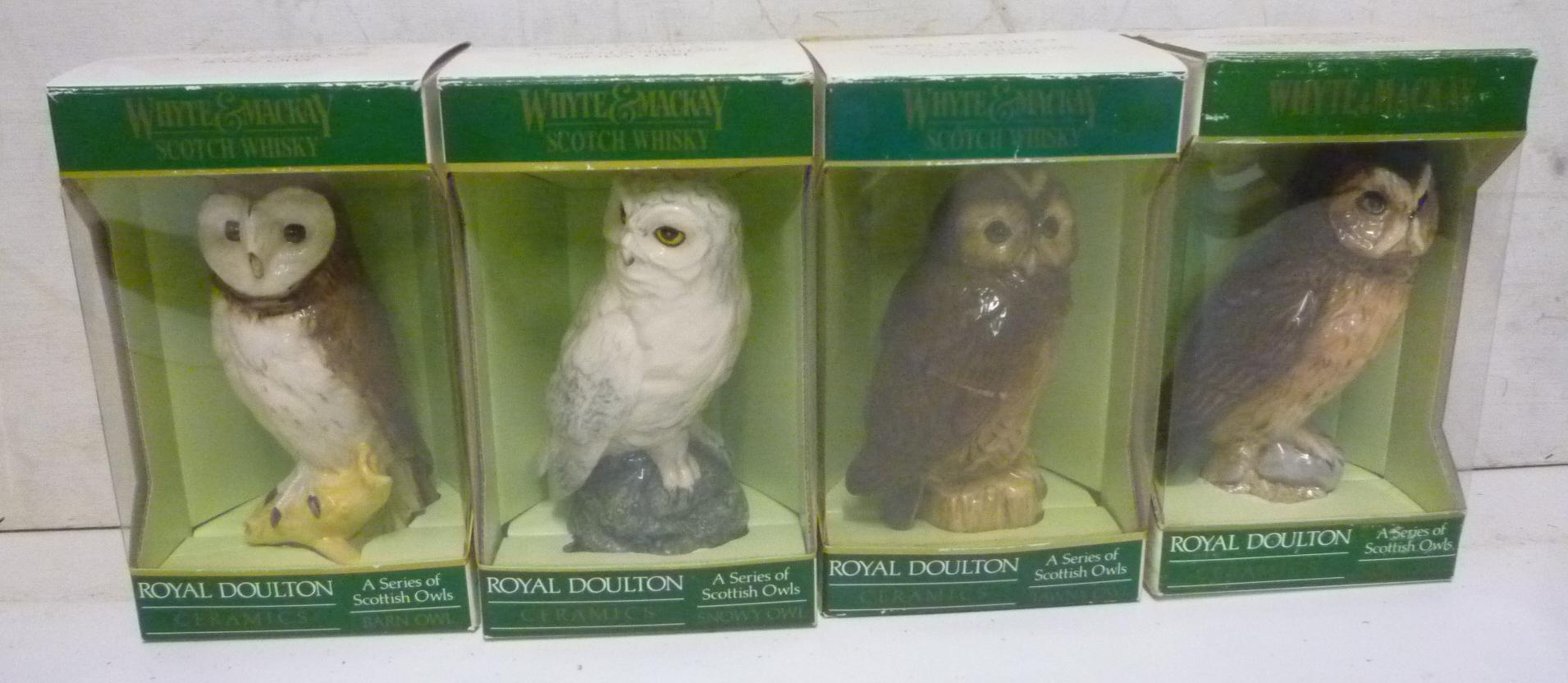 Four Royal Doulton pottery owls containing Whyte & MacKay Special Blended (200 ml each) (Est. plus Image
