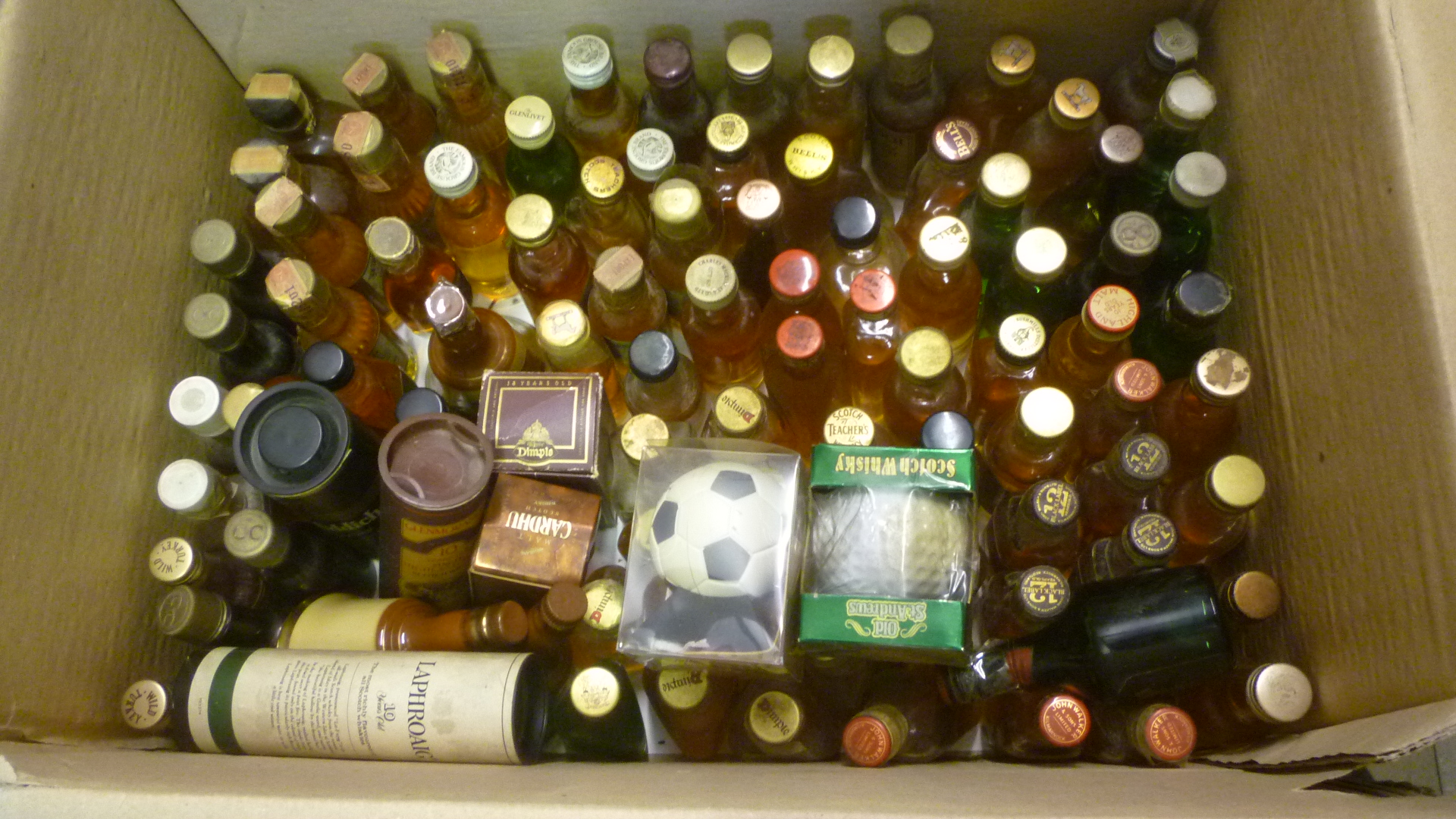 Approximately one hundred miniatures of malt and blended whisky Image