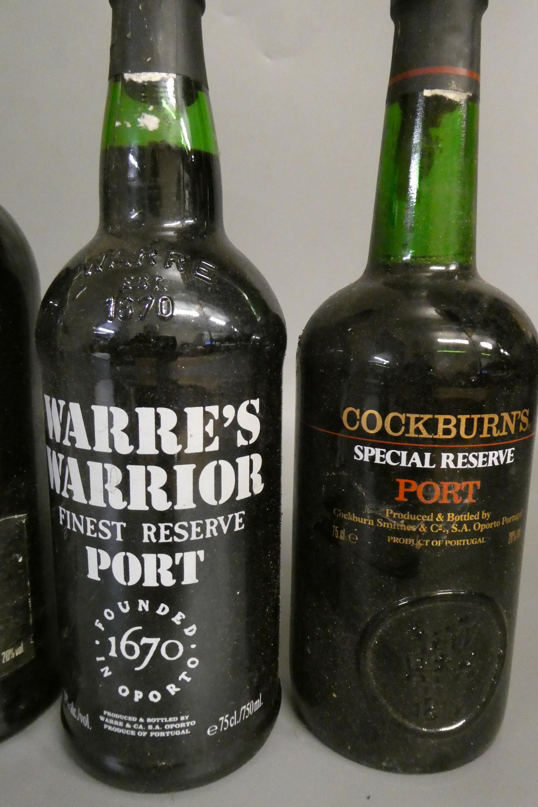 5 bottles of mixed alcohol Image