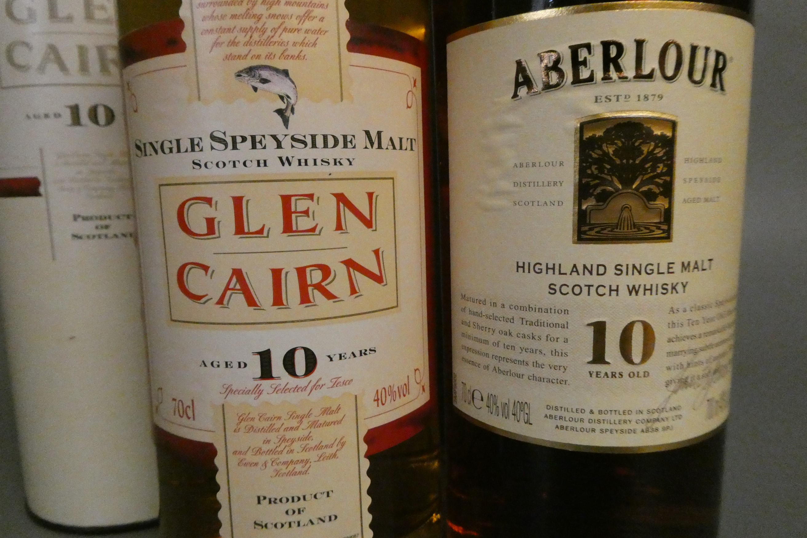 2 bottles of 10 year old single malt whisky, comprising 1 Aberlour and 1 Glen Cairn, both in tubes Image
