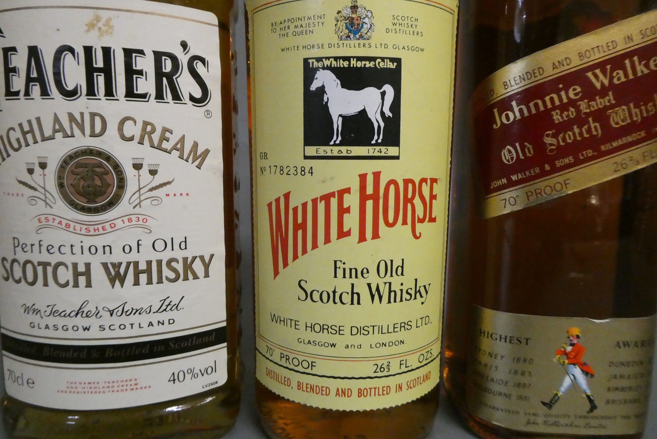 1 bottle White Horse fine old scotch whisky, 70°, together with a Johnnie Walker red label old Image