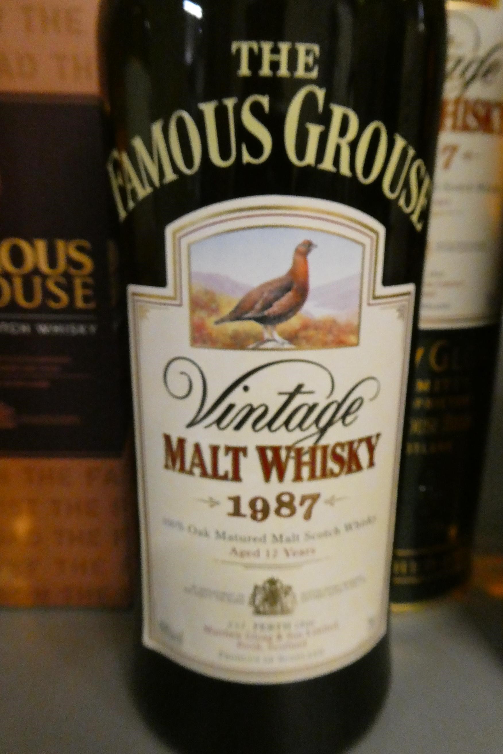 5 bottles of Famous Grouse whisky Image