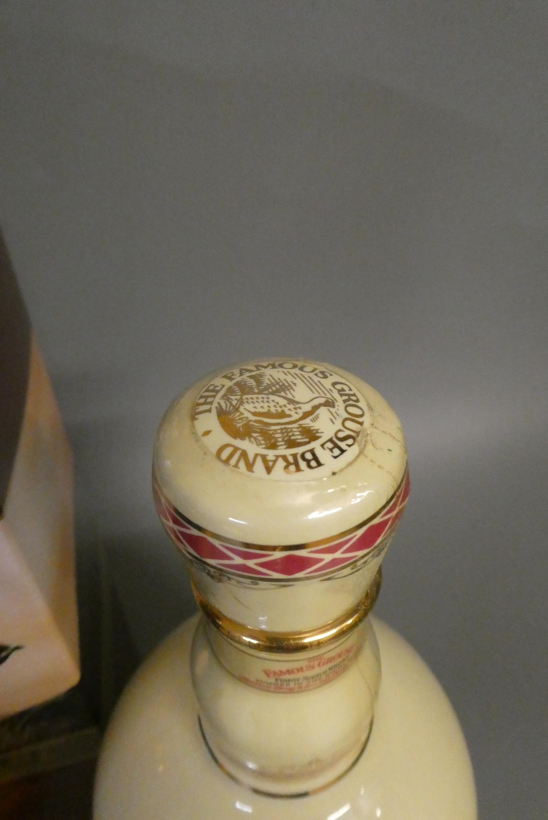 5 bottles of Famous Grouse whisky Image