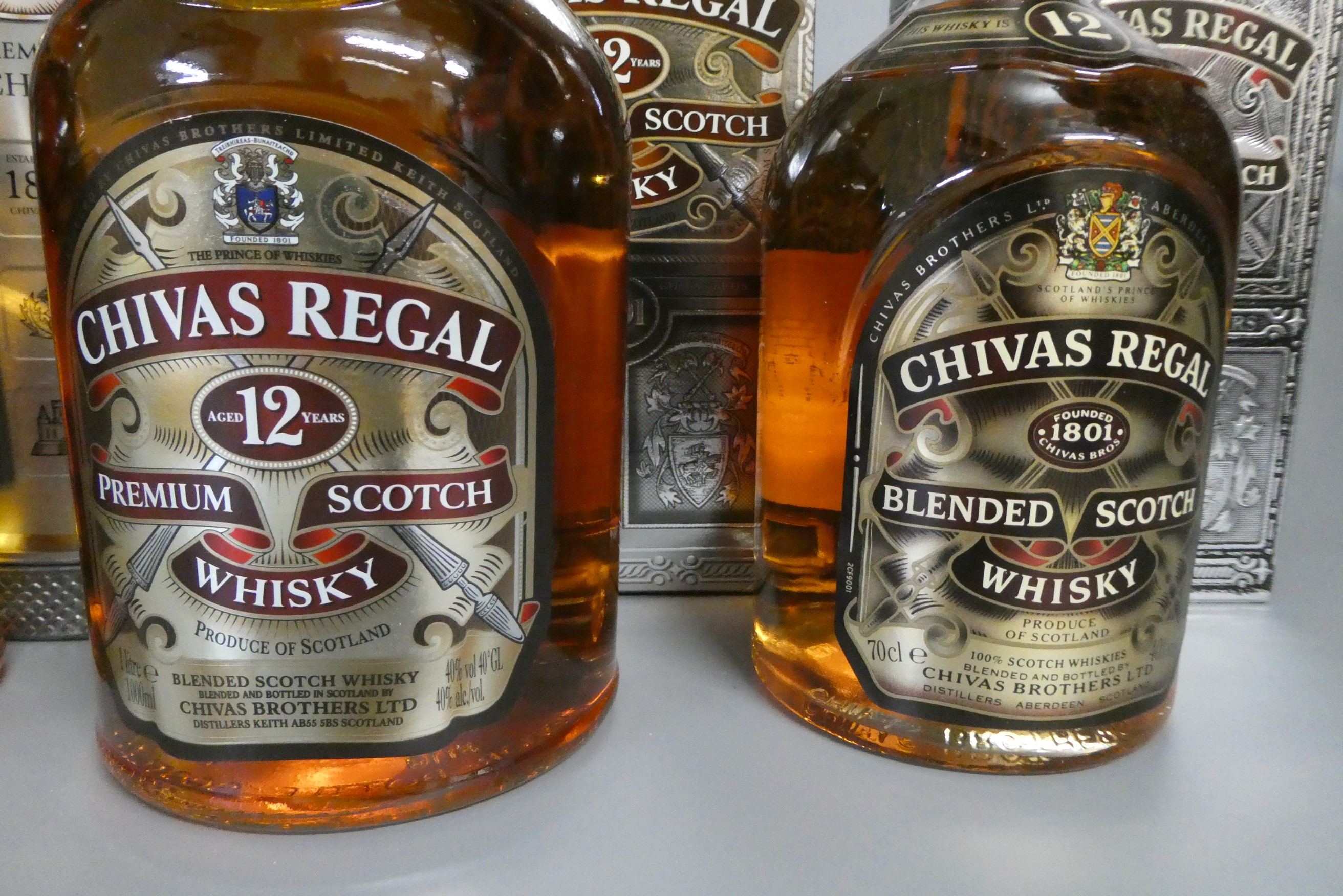 4 bottles of Chivas Regal scotch whisky, comprising 1 litre boxed 12 year old premium whisky, 2 70cl Image