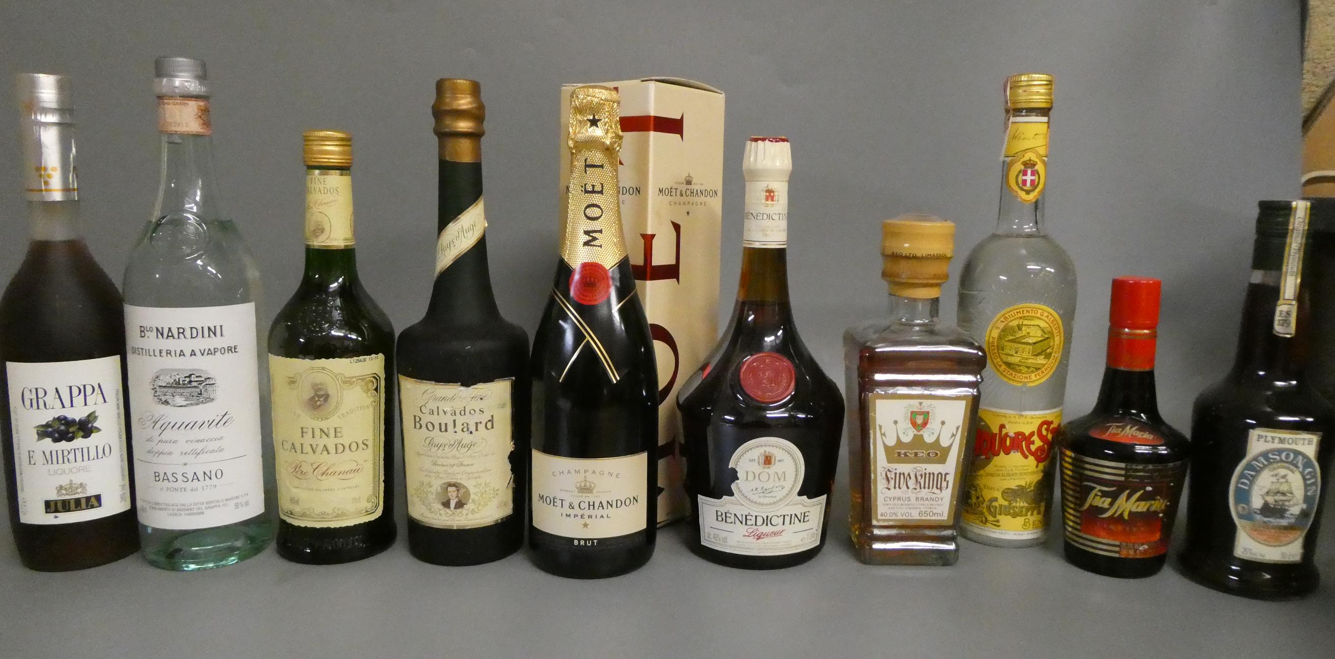 10 bottles of mixed alcohol, including Moet & Chandon champagne, Five Kings brandy, Fine Calvados, Image