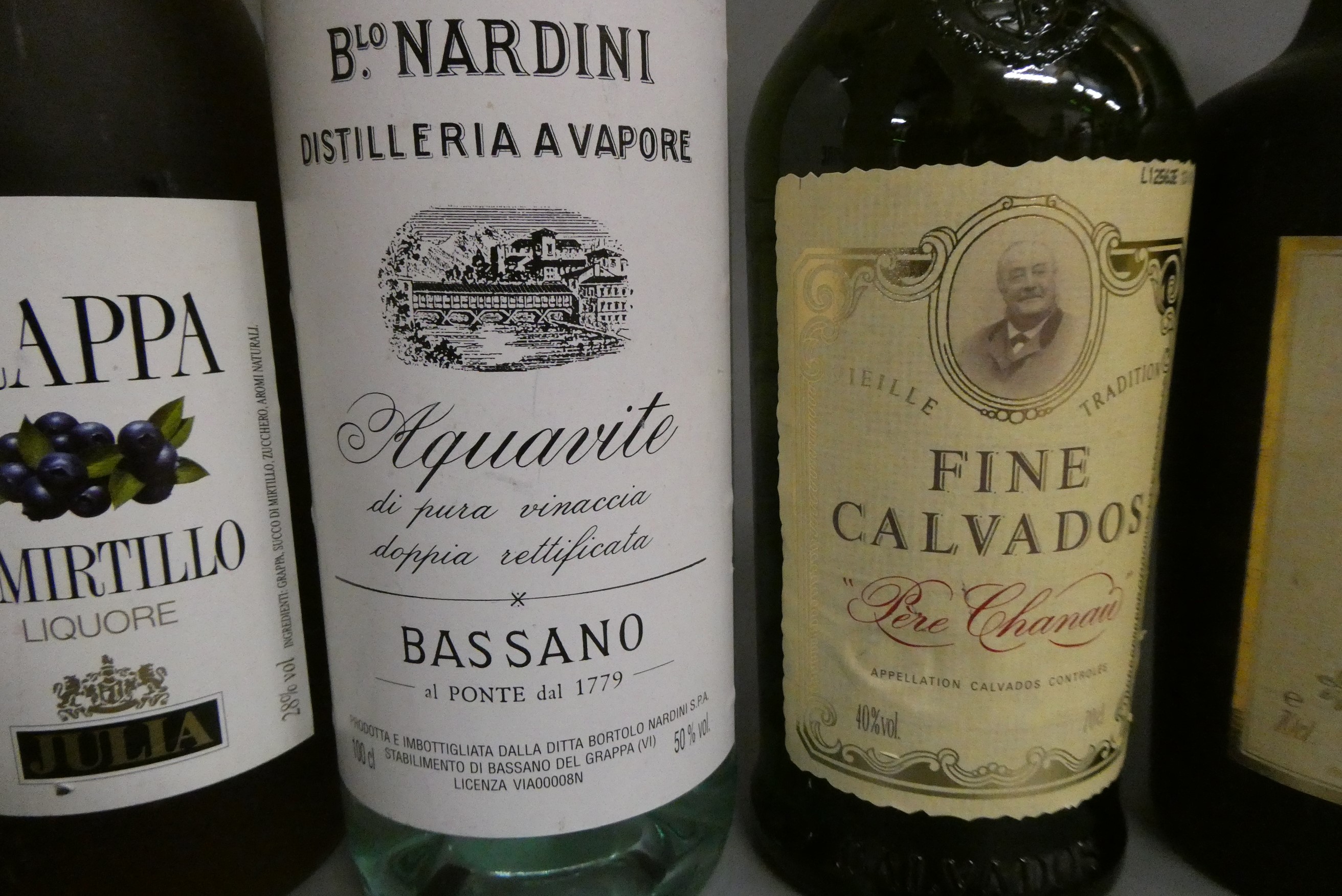 10 bottles of mixed alcohol, including Moet & Chandon champagne, Five Kings brandy, Fine Calvados, Image