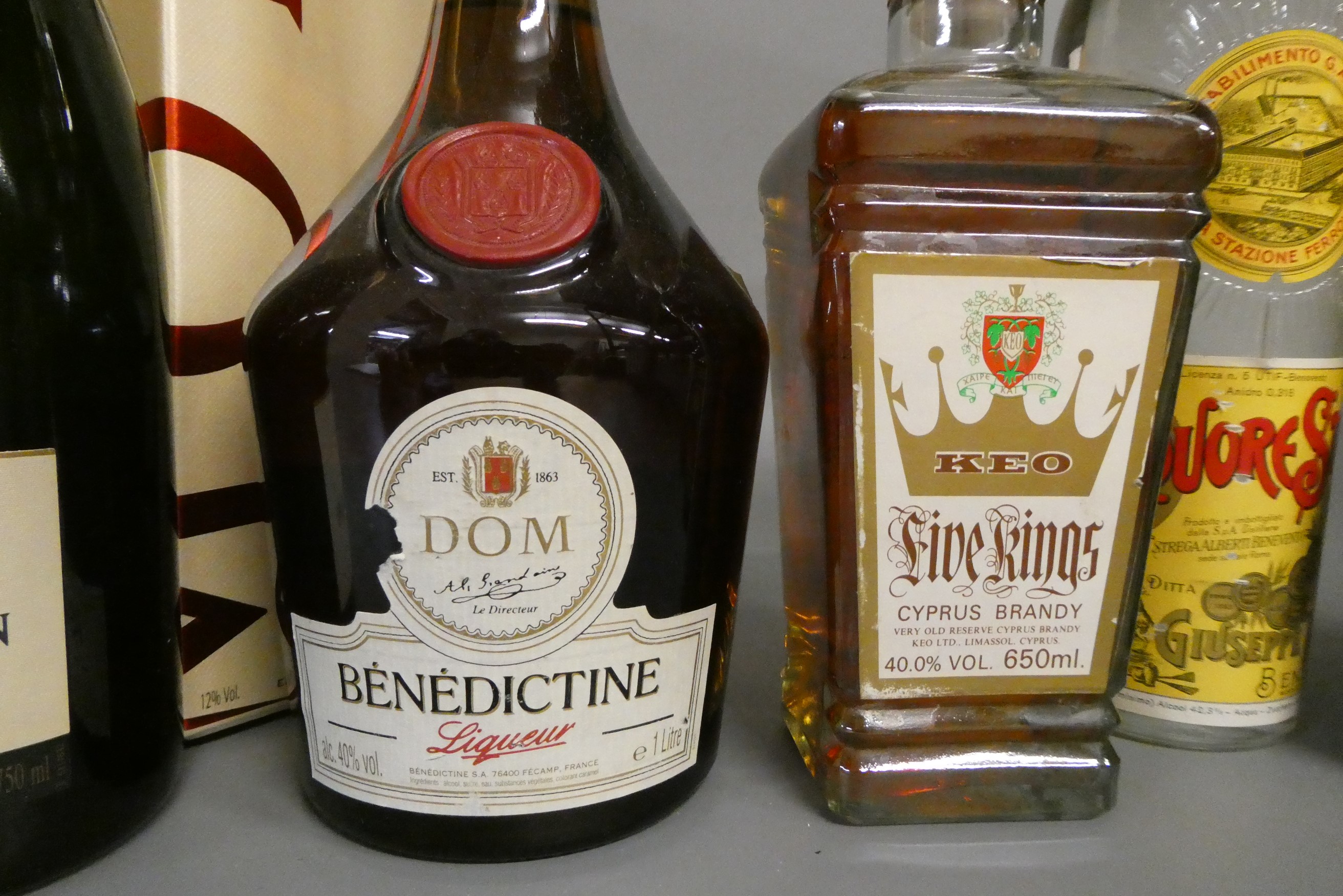 10 bottles of mixed alcohol, including Moet & Chandon champagne, Five Kings brandy, Fine Calvados, Image