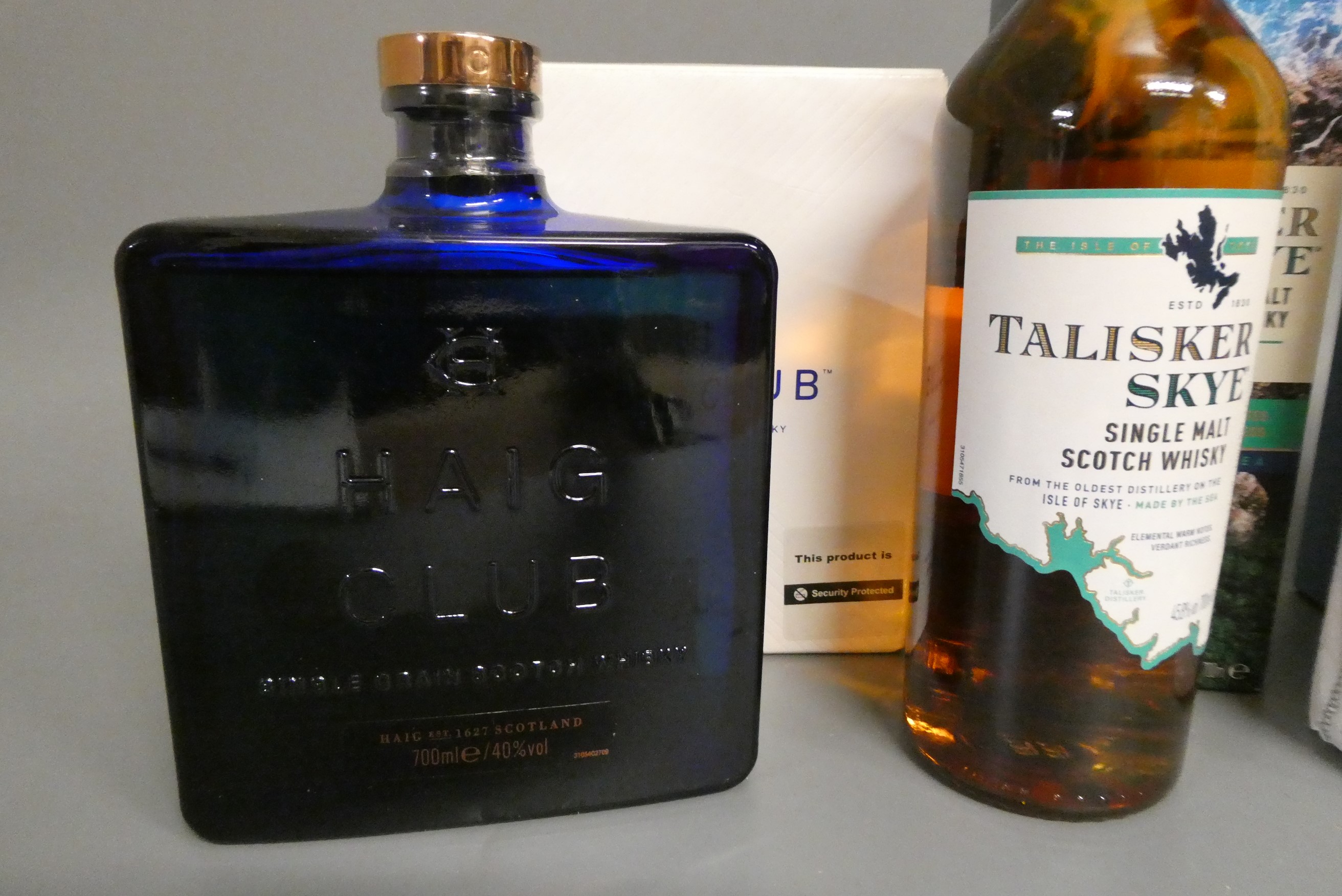 4 bottles of whisky Image