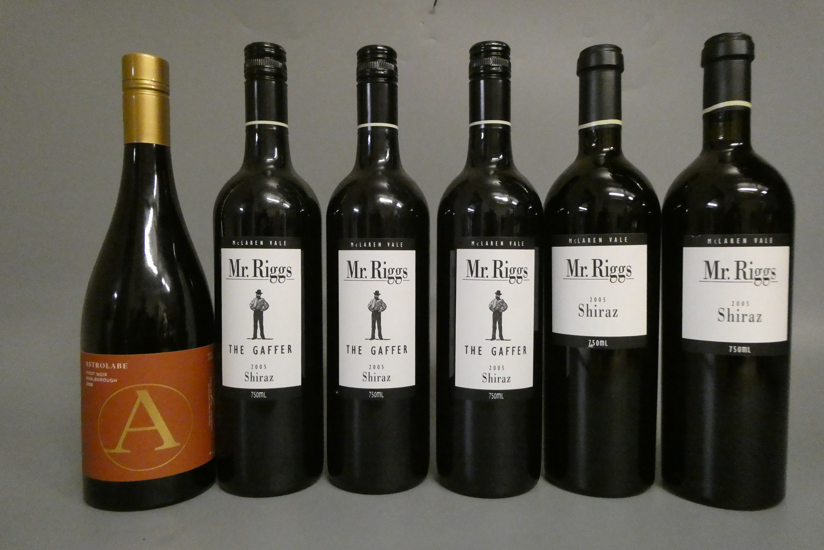 6 bottles comprising 3 Mr Riggs 2005 The Gaffer shiraz, 2 Mr Riggs 2005 shiraz and 1 Astrolabe 2018 Image